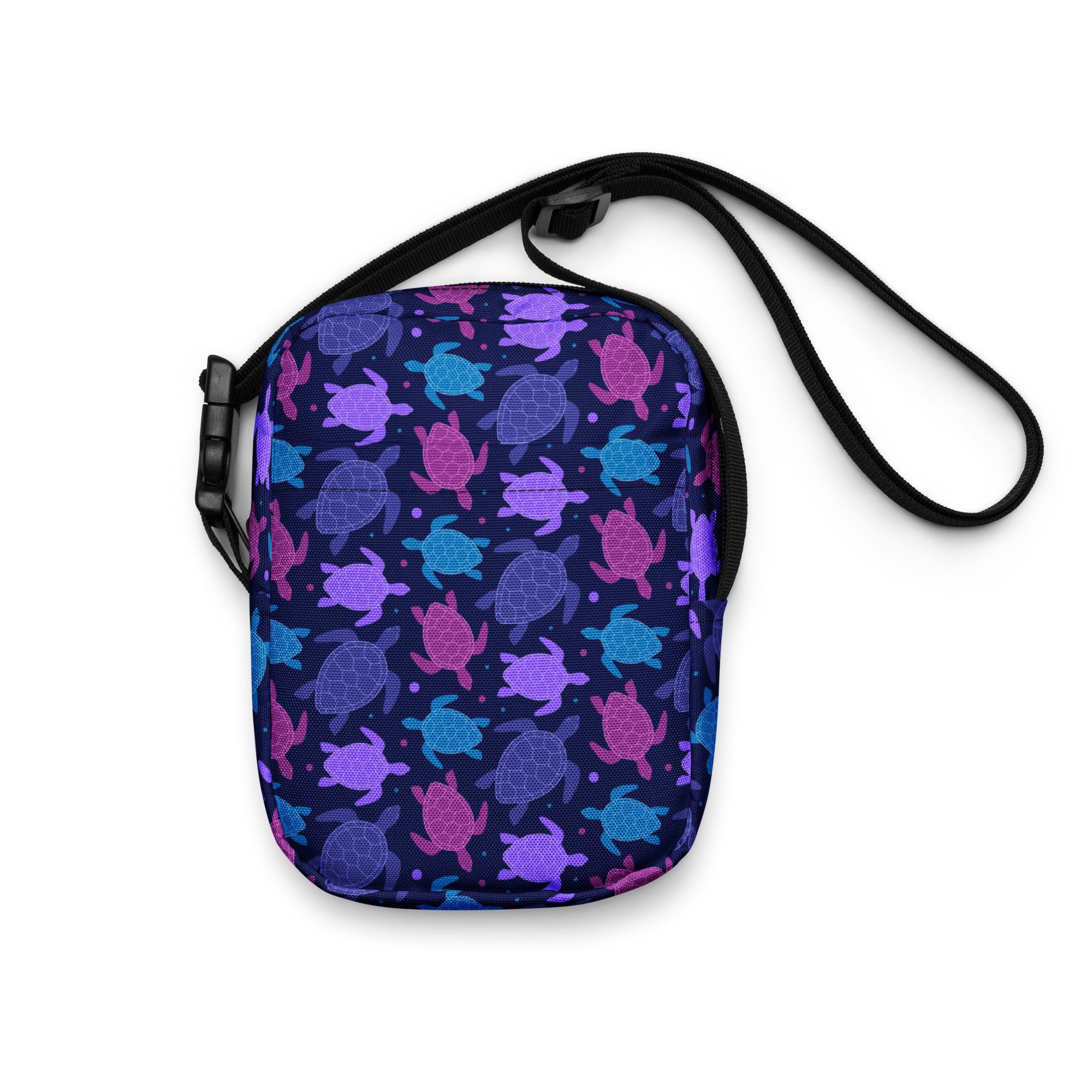 Girls purple sea turtle crossbody purse in navy blue with a vibrant multicolored sea turtle pattern