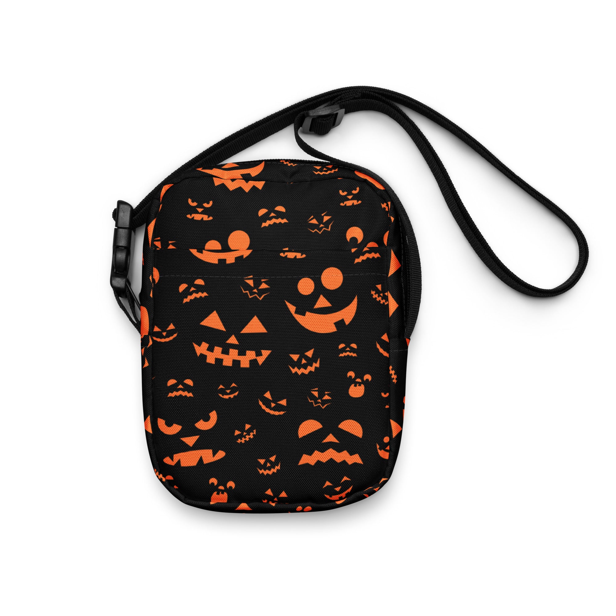 Black crossbody bag with orange jack-o’-lantern faces printed, perfect halloween purse for girls