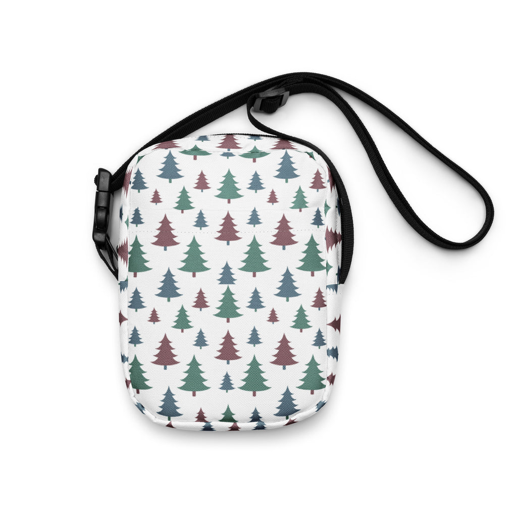 A white girls pastel Christmas trees crossbody purse with green and maroon tree patterns and a black adjustable strap