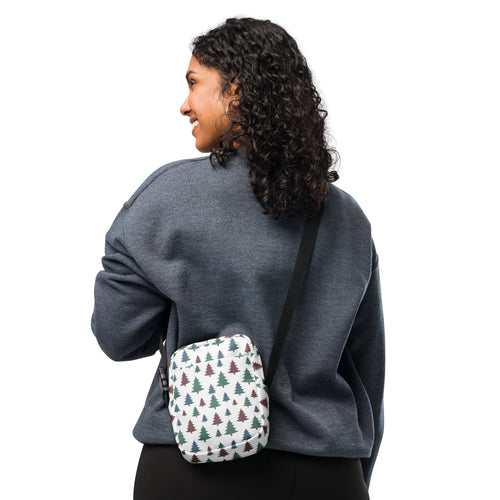White crossbody bag with green and maroon pine tree pattern perfect for winter and christmas use