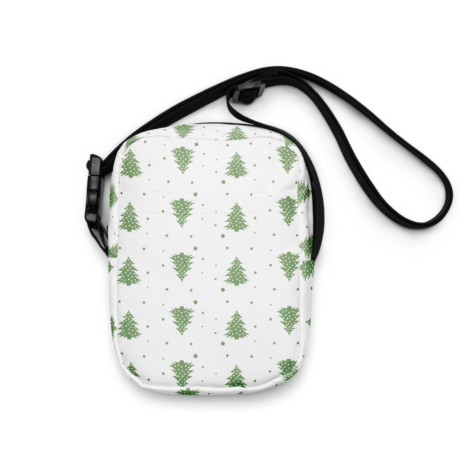 White crossbody bag with green pine tree pattern and black adjustable strap for girls Christmas use