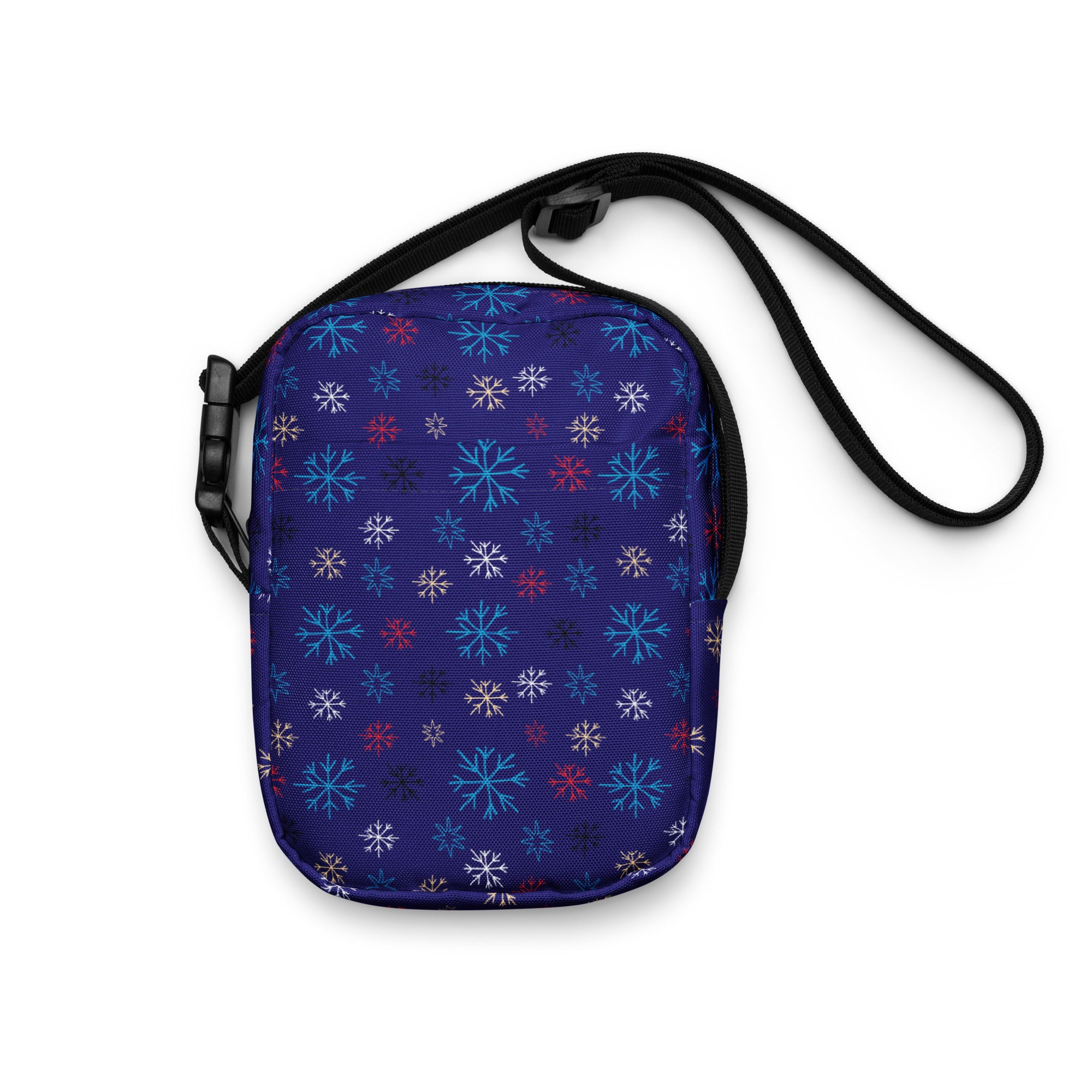 Girls navy crossbody purse with vibrant multicolor snowflake pattern in white light blue and red for daily use