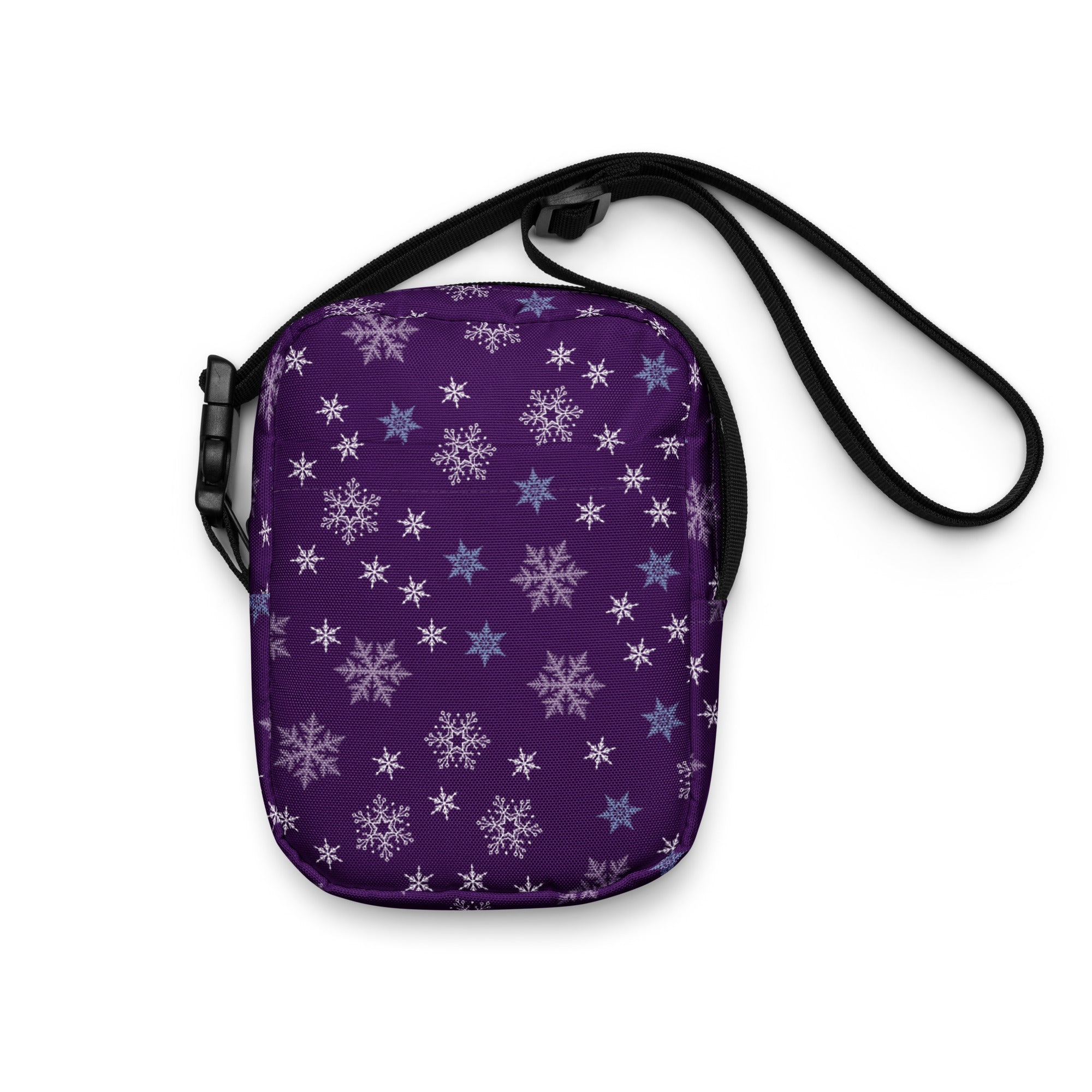 Girls purple snowflakes crossbody purse with white and light blue snowflake pattern and black adjustable strap