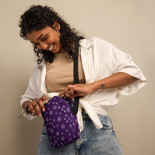 Purple crossbody bag with white snowflake pattern designed for Christmas winter use in womens fashion