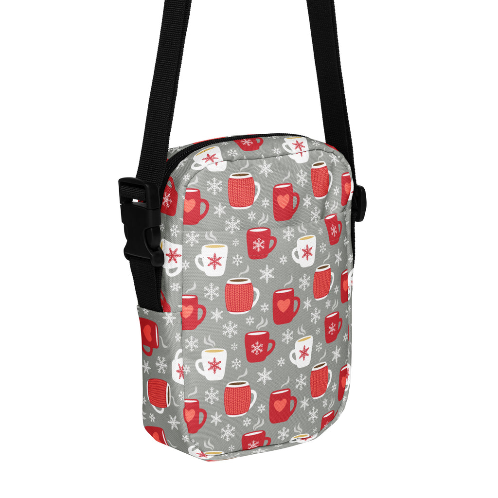 Gray crossbody bag with festive red and white mug and snowflake pattern perfect for cozy winter use