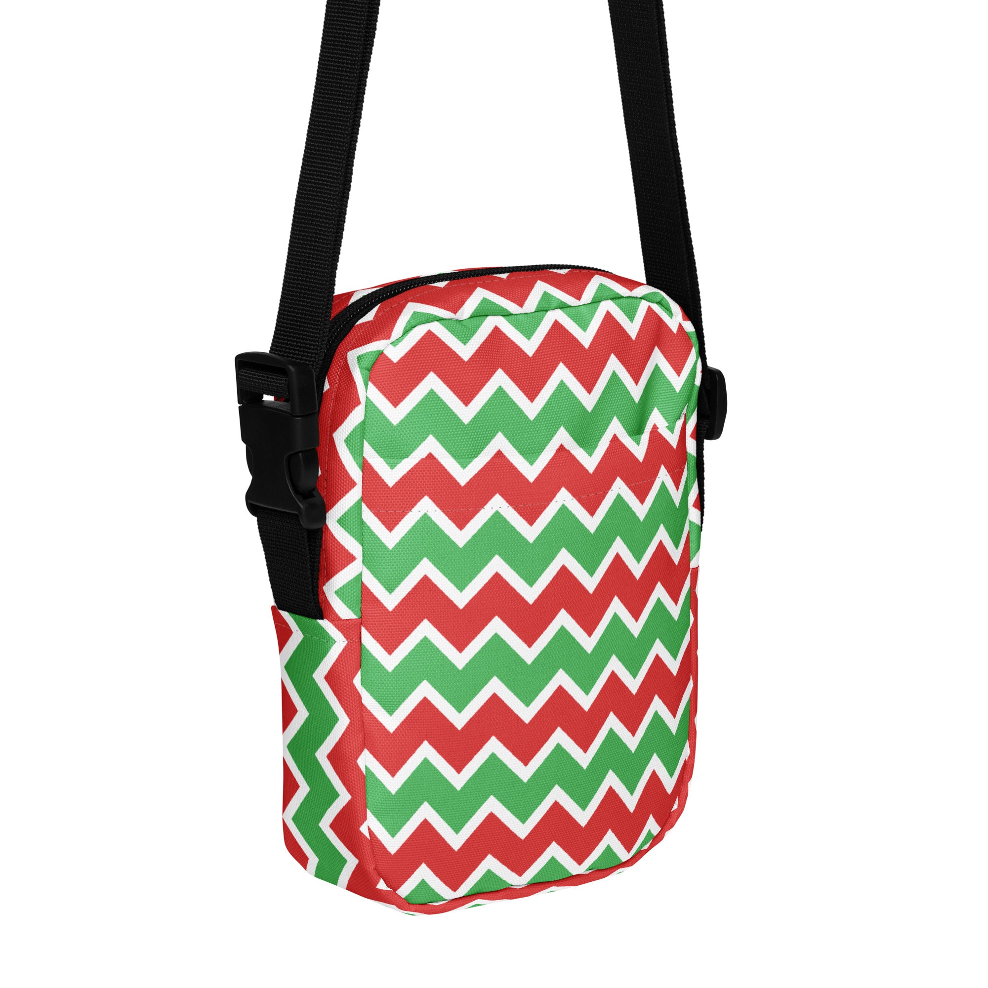 Girls red and green chevron crossbody purse with festive pattern and black straps for easy carrying