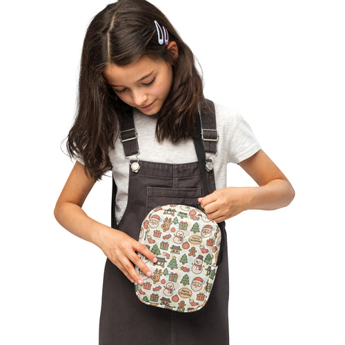 Girls doodle christmas crossbody purse with white base and colorful santa snowmen reindeer trees and gifts illustrations