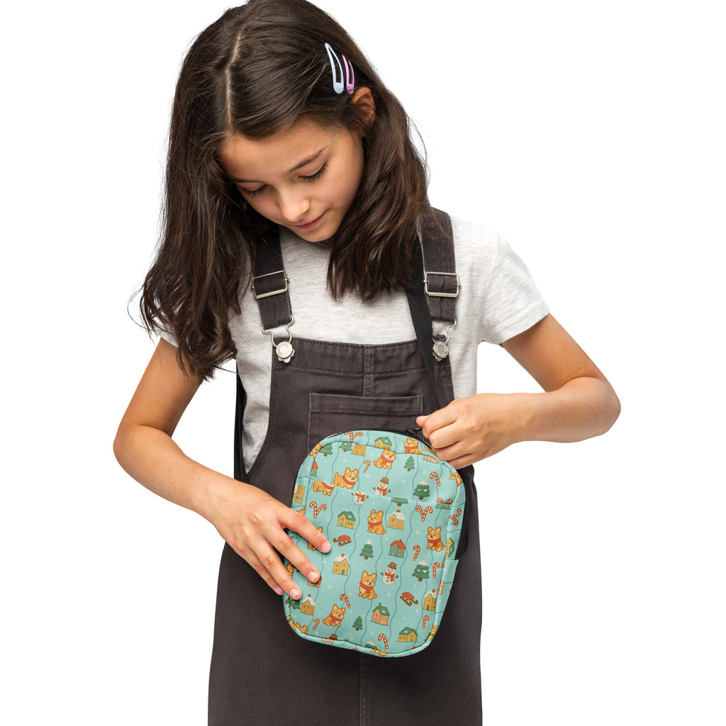Teal quilted girls corgi winter wonderland crossbody purse with cartoon foxes houses and candy canes pattern