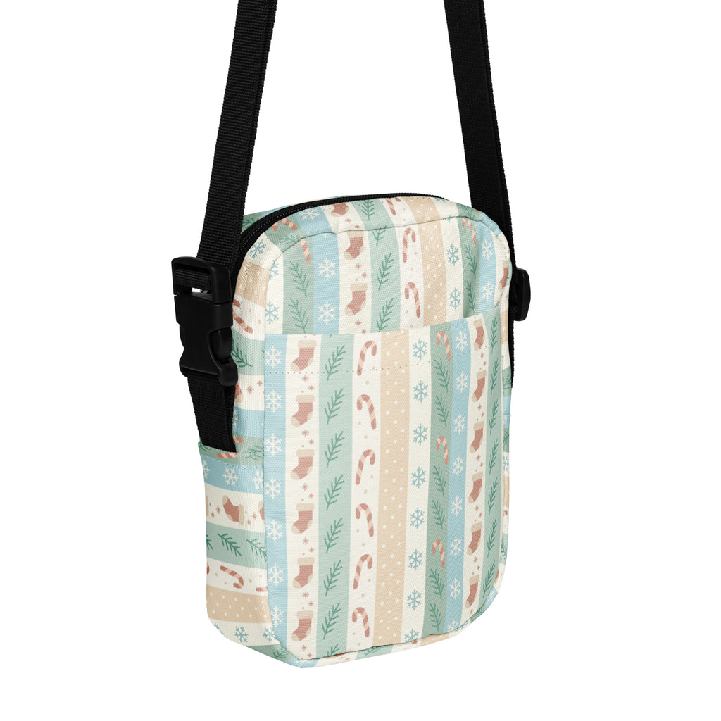 Girls pastel striped christmas crossbody purse with vertical mint cream beige stripes and holiday motifs on soft fabric
