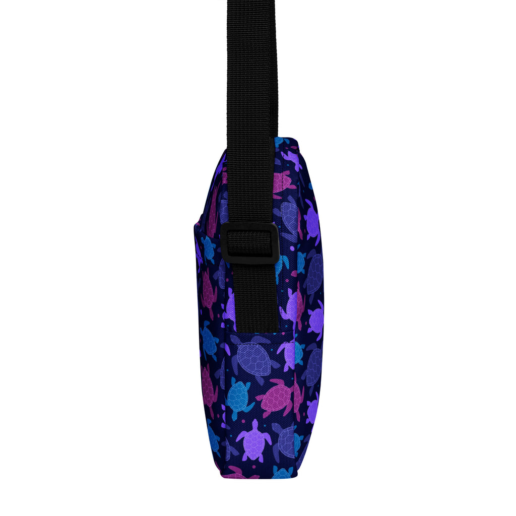 Girls purple sea turtle crossbody purse in navy blue with multicolored sea turtle pattern in purple pink and teal