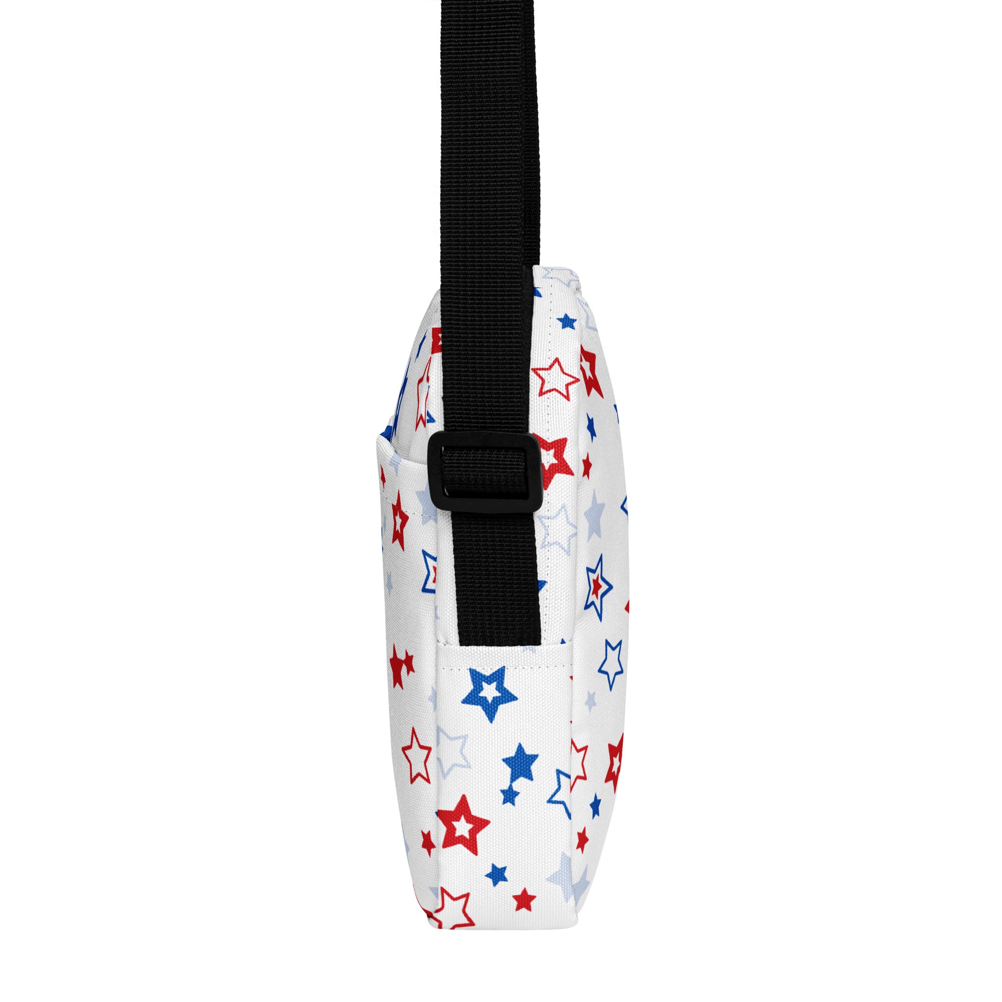 Girls red white and blue stars crossbody purse with white fabric and a playful pattern of red blue and silver stars