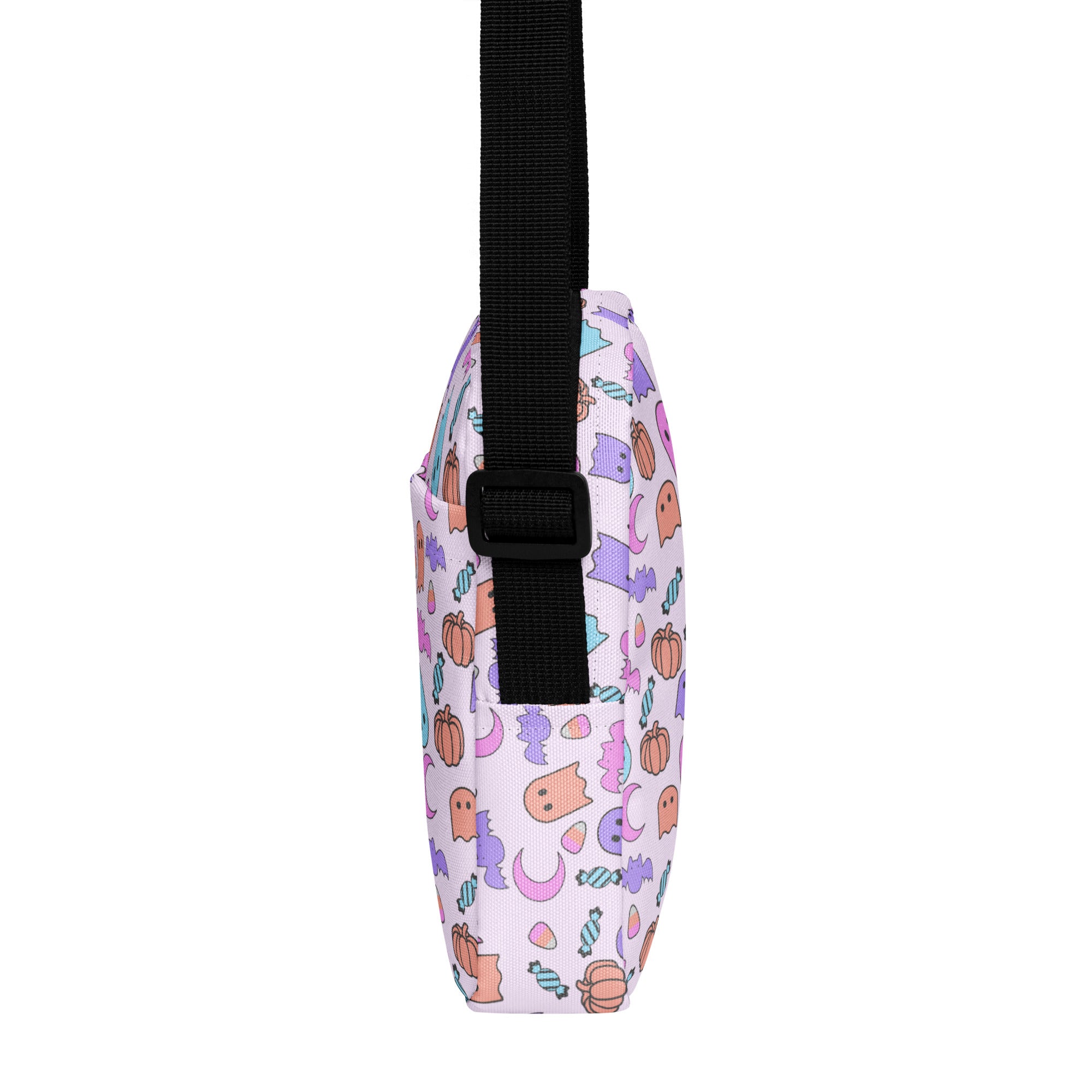 White crossbody bag for girls with pastel pumpkin ghost and candy pattern perfect for halloween use
