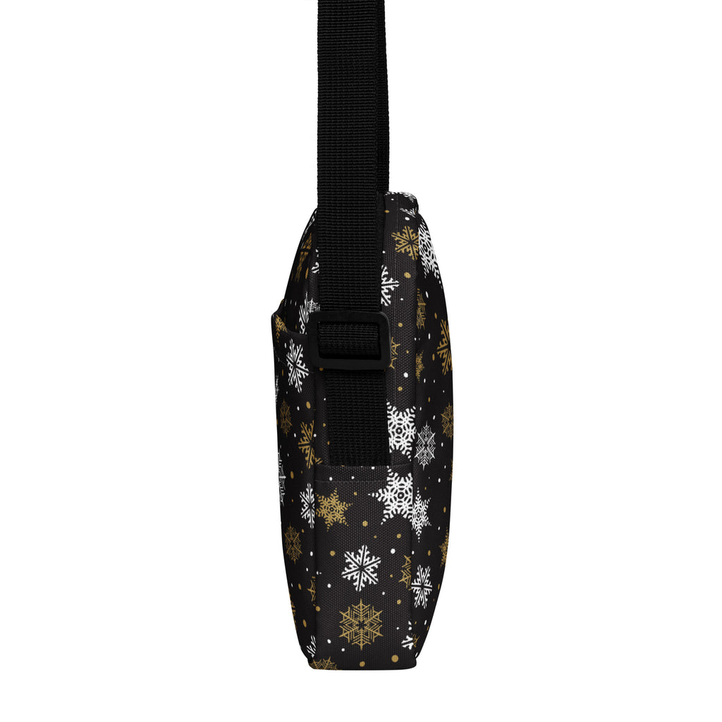 Girls black crossbody purse with gold and white snowflake festive pattern perfect for holiday outings