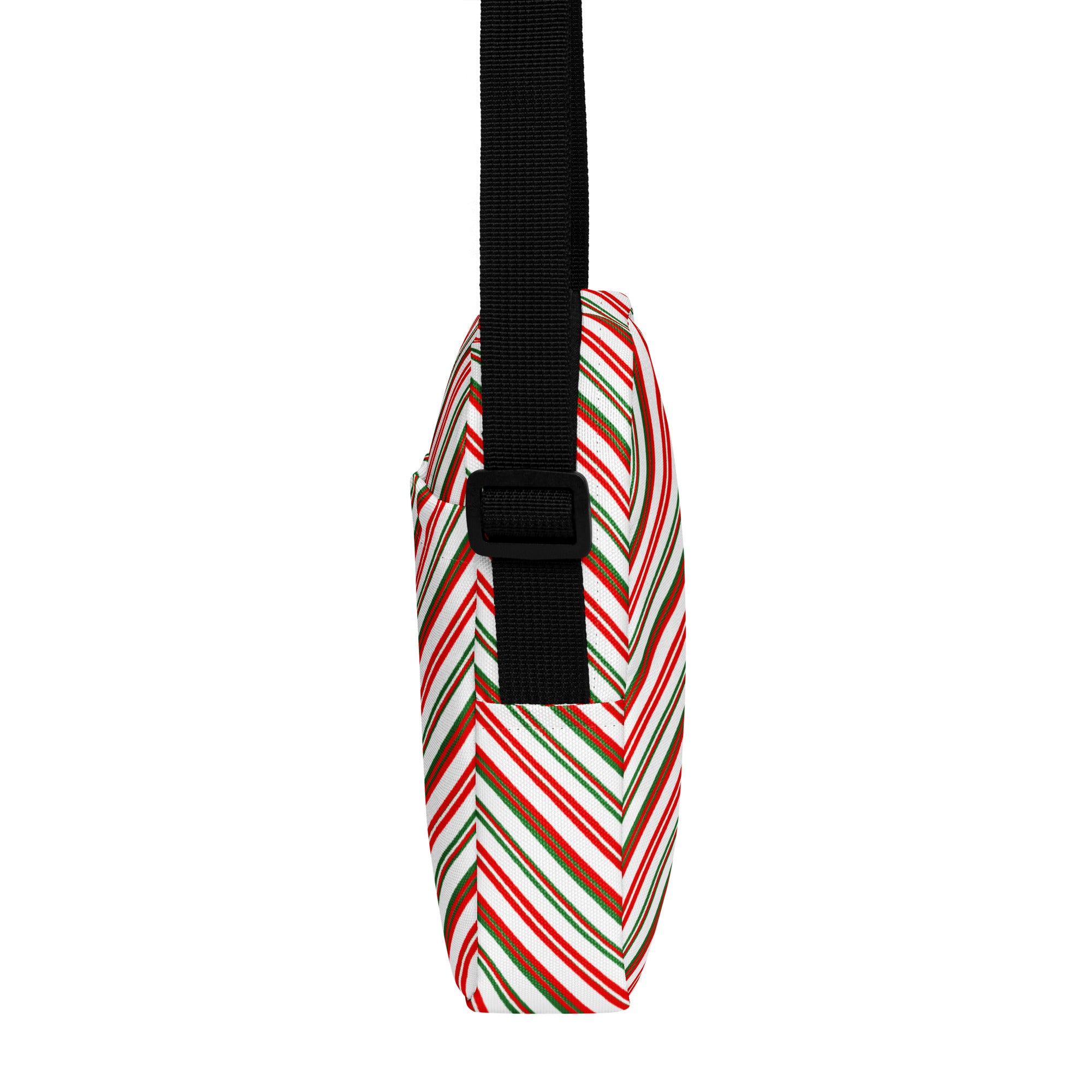 Girls christmas stripes crossbody purse with candy cane pattern, black adjustable strap, and zipper closure