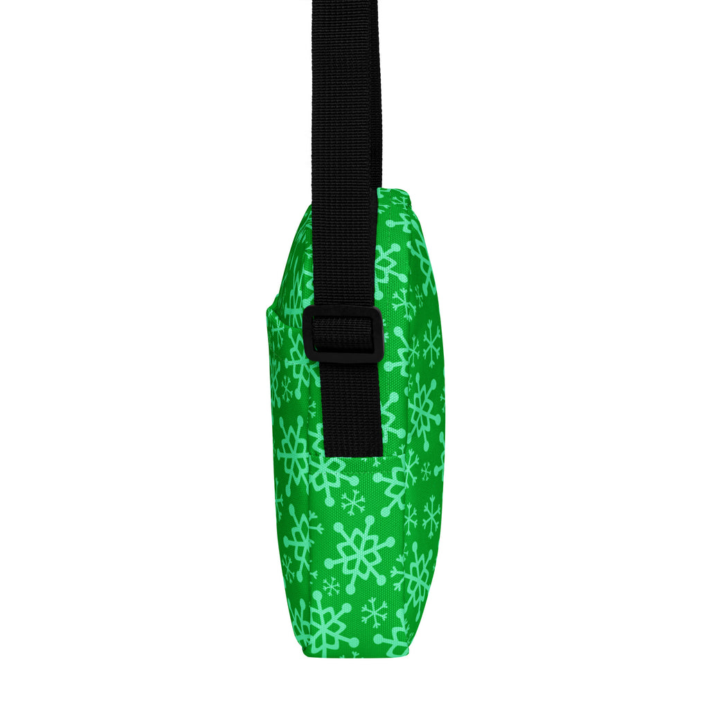 Green snowflake patterned crossbody bag with black strap for women perfect for Christmas and holiday use