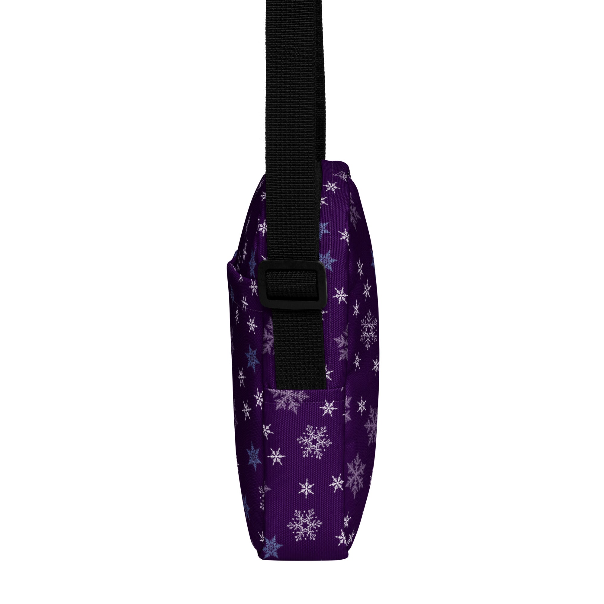 Girls purple snowflakes crossbody purse with black adjustable strap featuring a snowflake pattern design