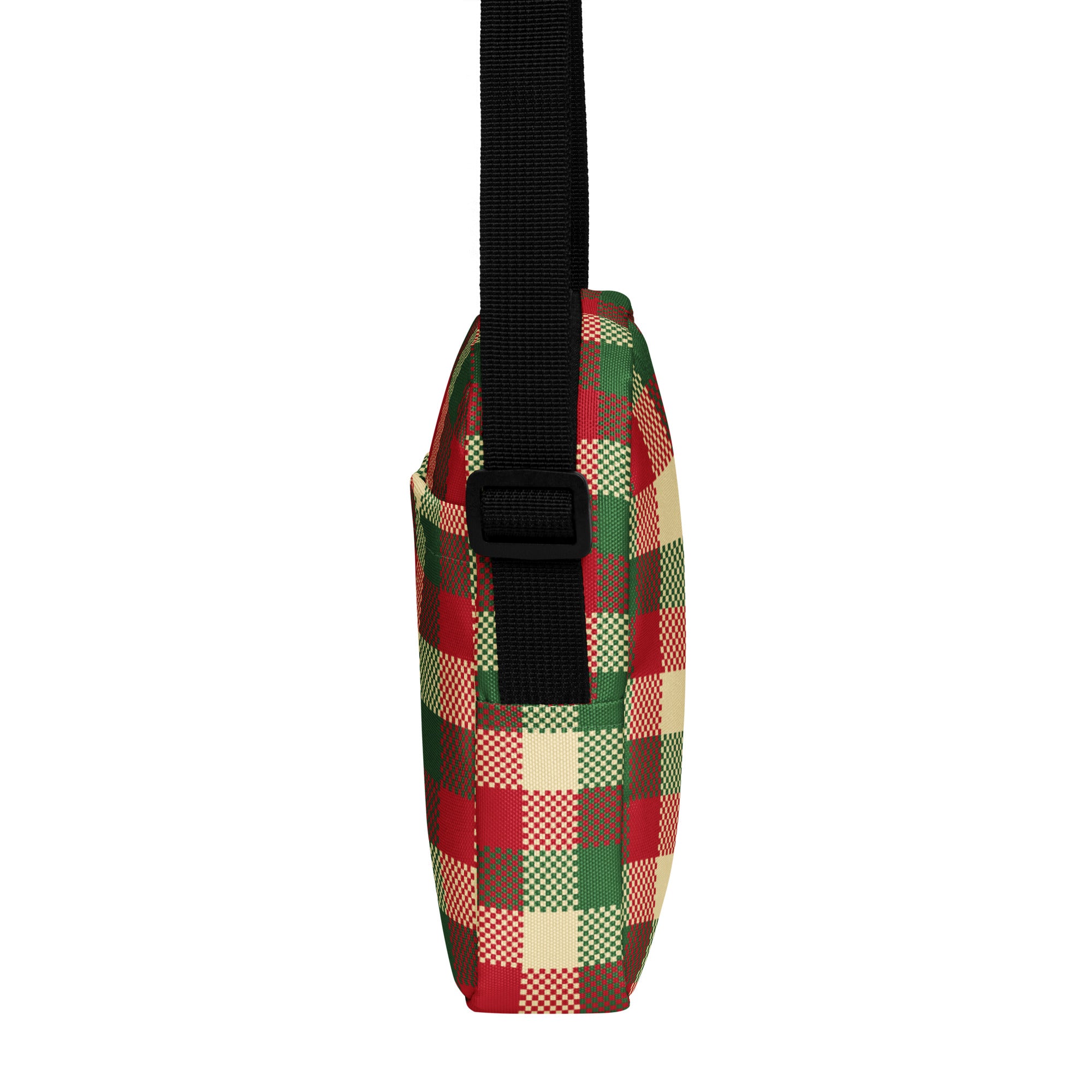 A festive red green and beige plaid winter crossbody purse with a black adjustable strap for women