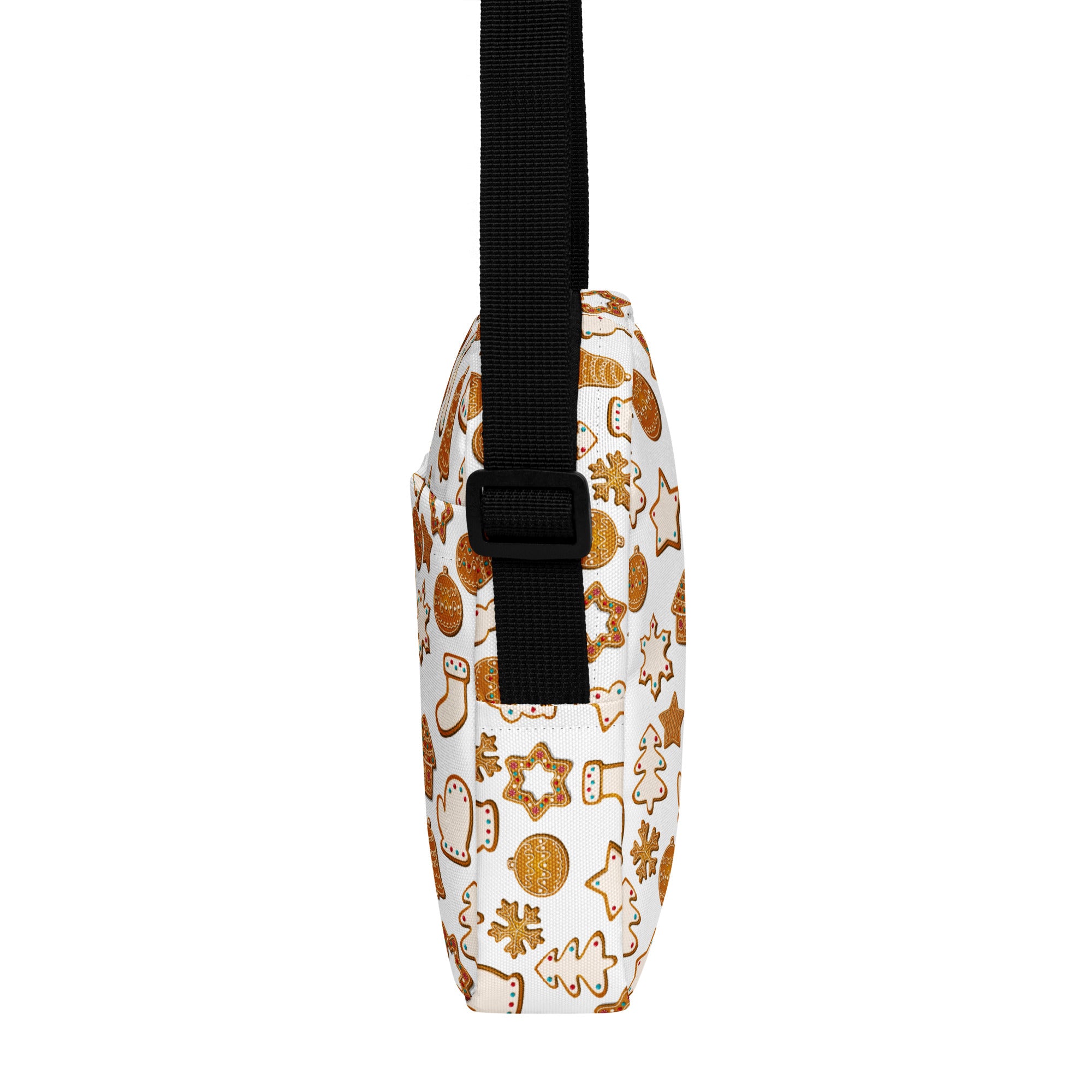 White crossbody purse with gold holiday cookie and ornament patterns and a black adjustable strap for women