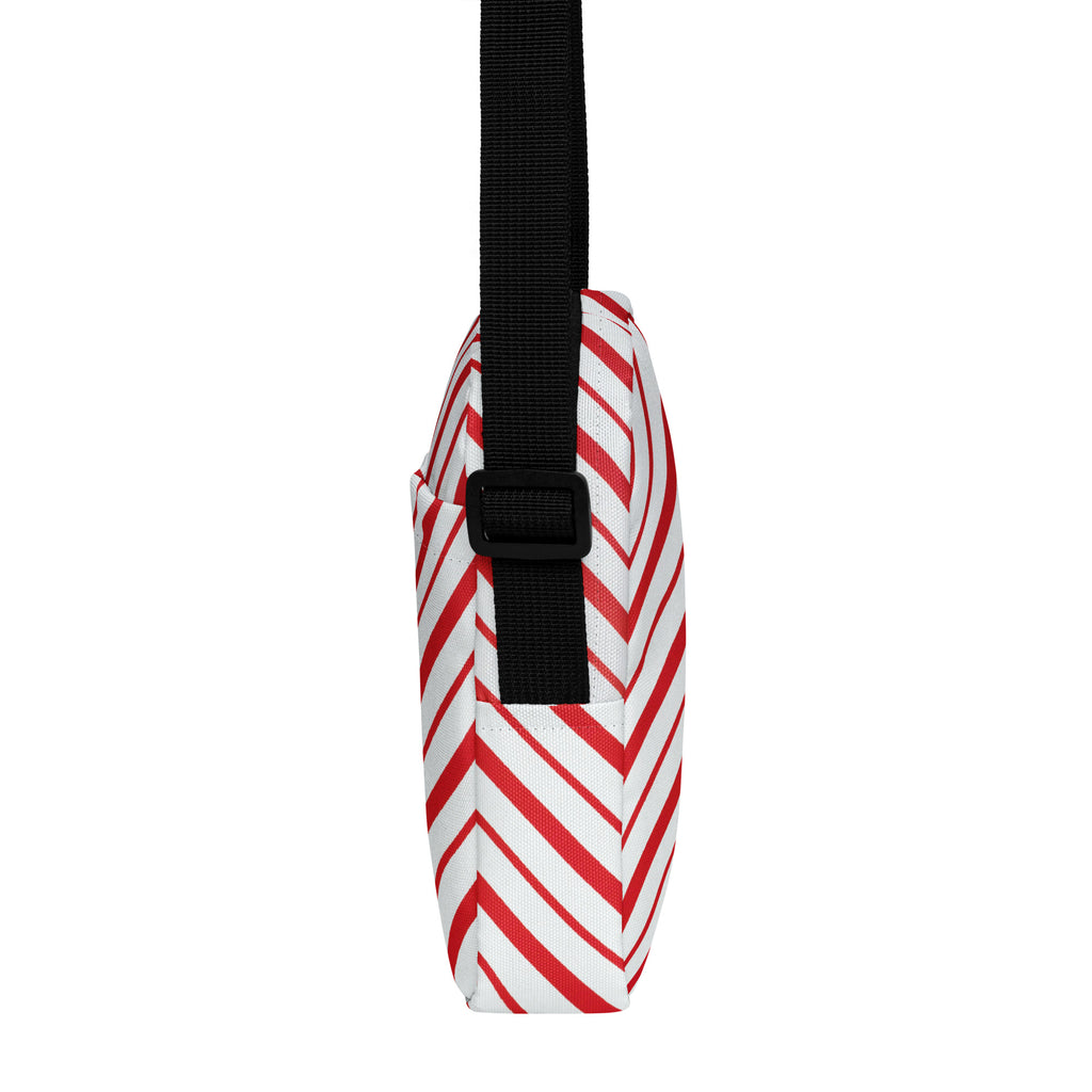 Red candy stripe christmas womens crossbody purse with red and white chevron pattern and black adjustable strap