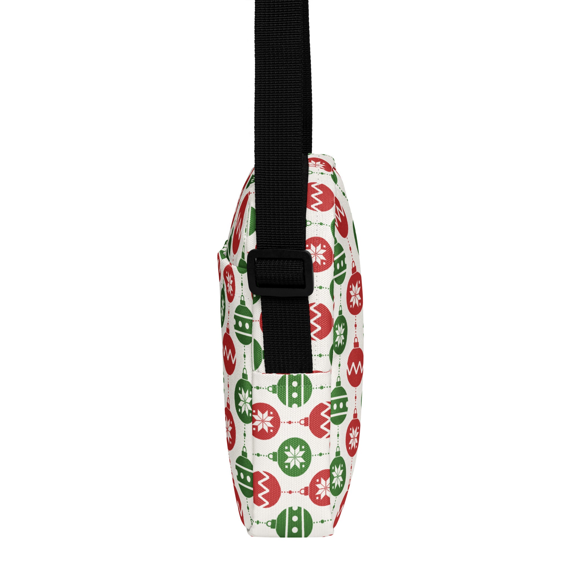 White crossbody bag with red and green christmas ornament pattern and black adjustable strap for girls