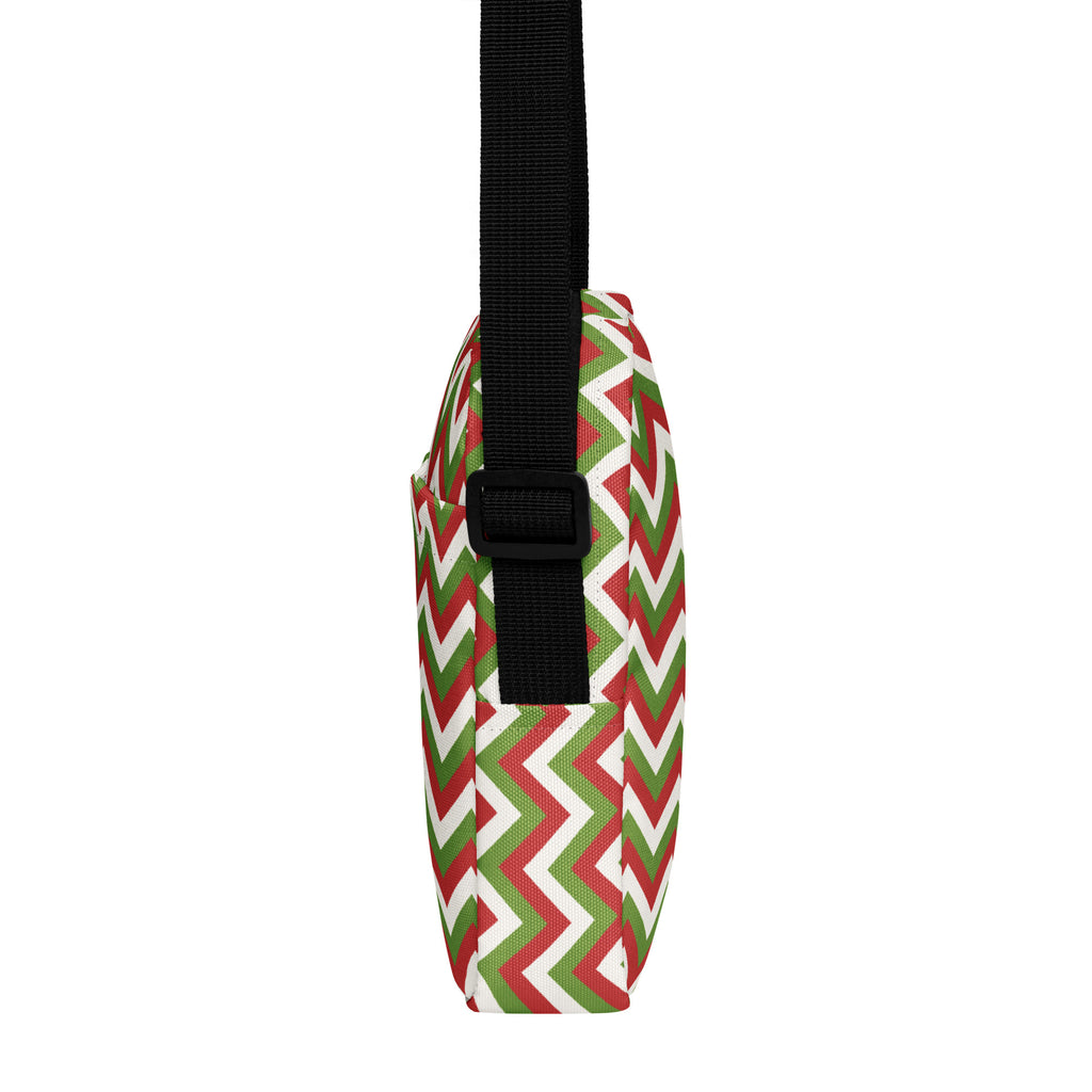 Girls christmas chevron crossbody purse in red green and white zigzag pattern with black adjustable strap