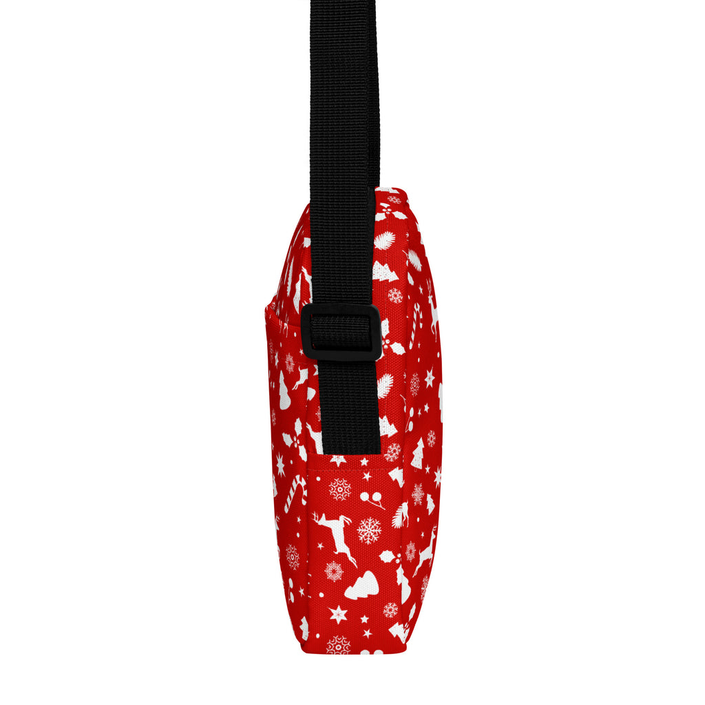 Girls red crossbody purse with white christmas pattern and black adjustable strap for festive use