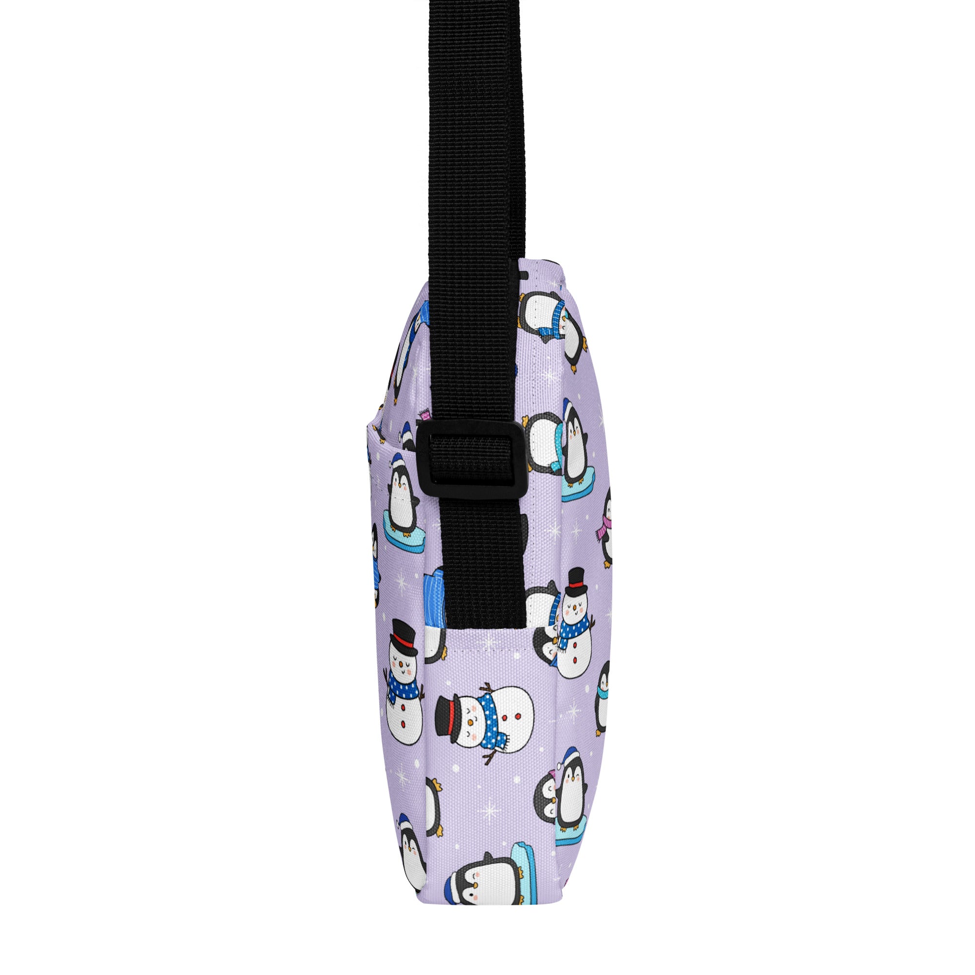 Lavender girls winter penguin crossbody purse with playful cartoon penguin and snowman pattern and black adjustable strap