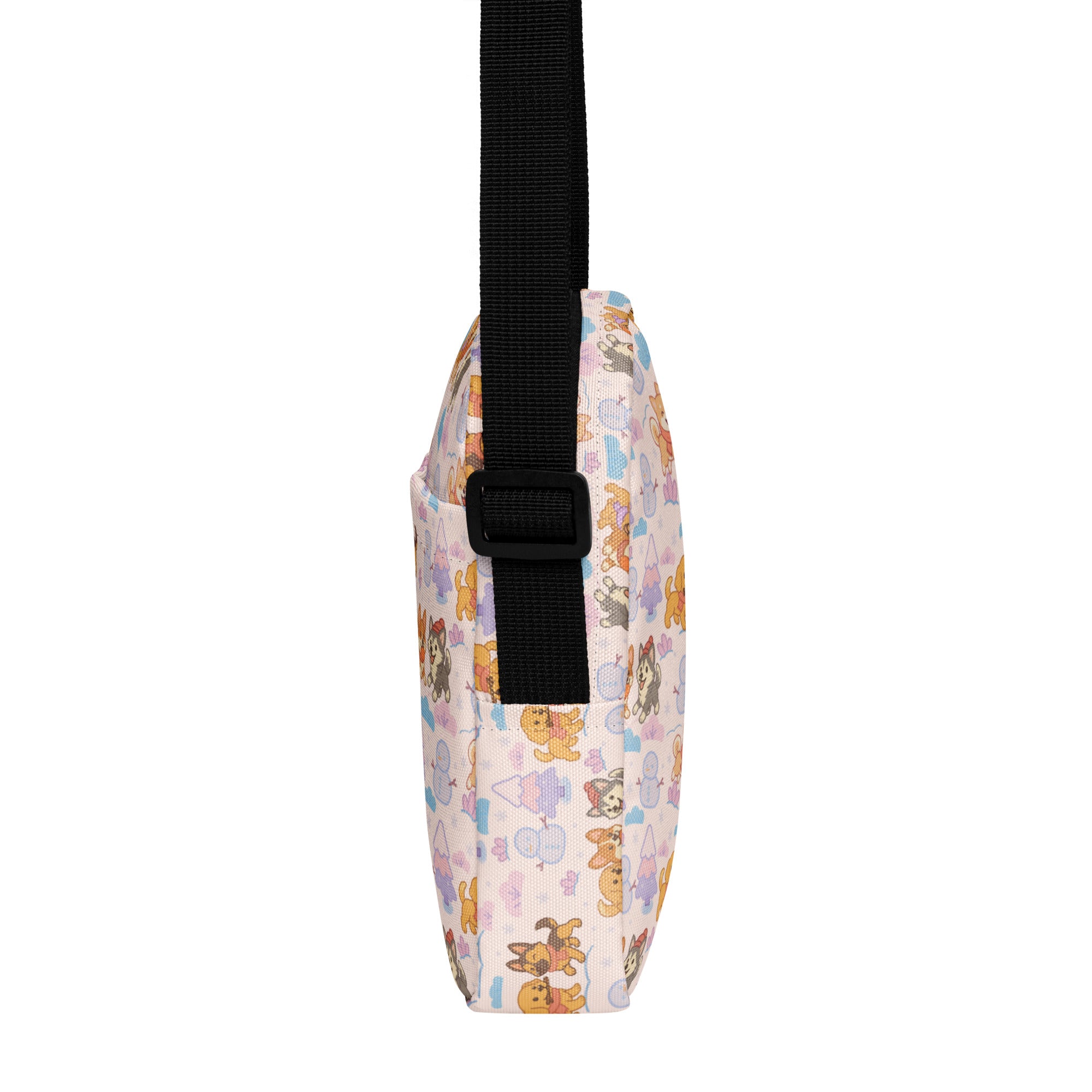 Girls winter dog crossbody purse with pastel colors and playful cartoon cats and balloons pattern and black strap
