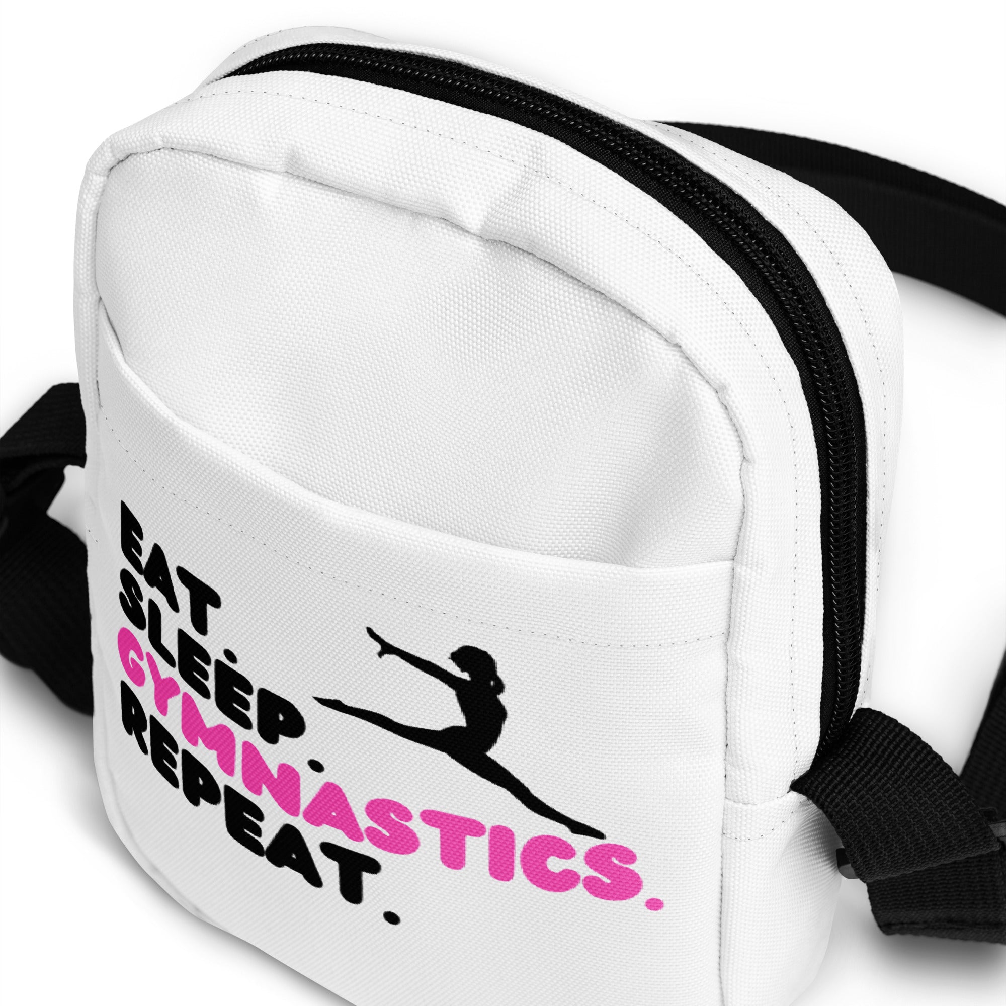 Girls eat sleep gymnastics repeat white canvas crossbody bag with black zipper straps and pink black graphic silhouette