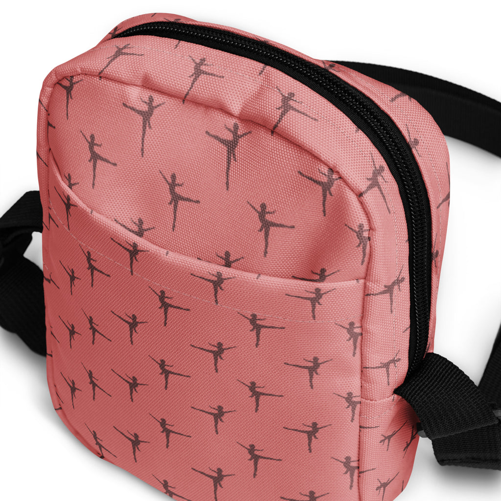Girls ballet dancer crossbody purse in pink with black ballet dancer silhouettes and black zipper closure
