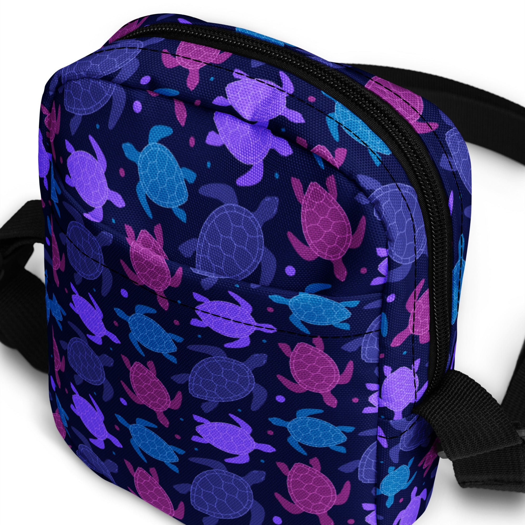 Girls purple sea turtle crossbody purse in navy blue with vibrant purple pink and teal sea turtle pattern