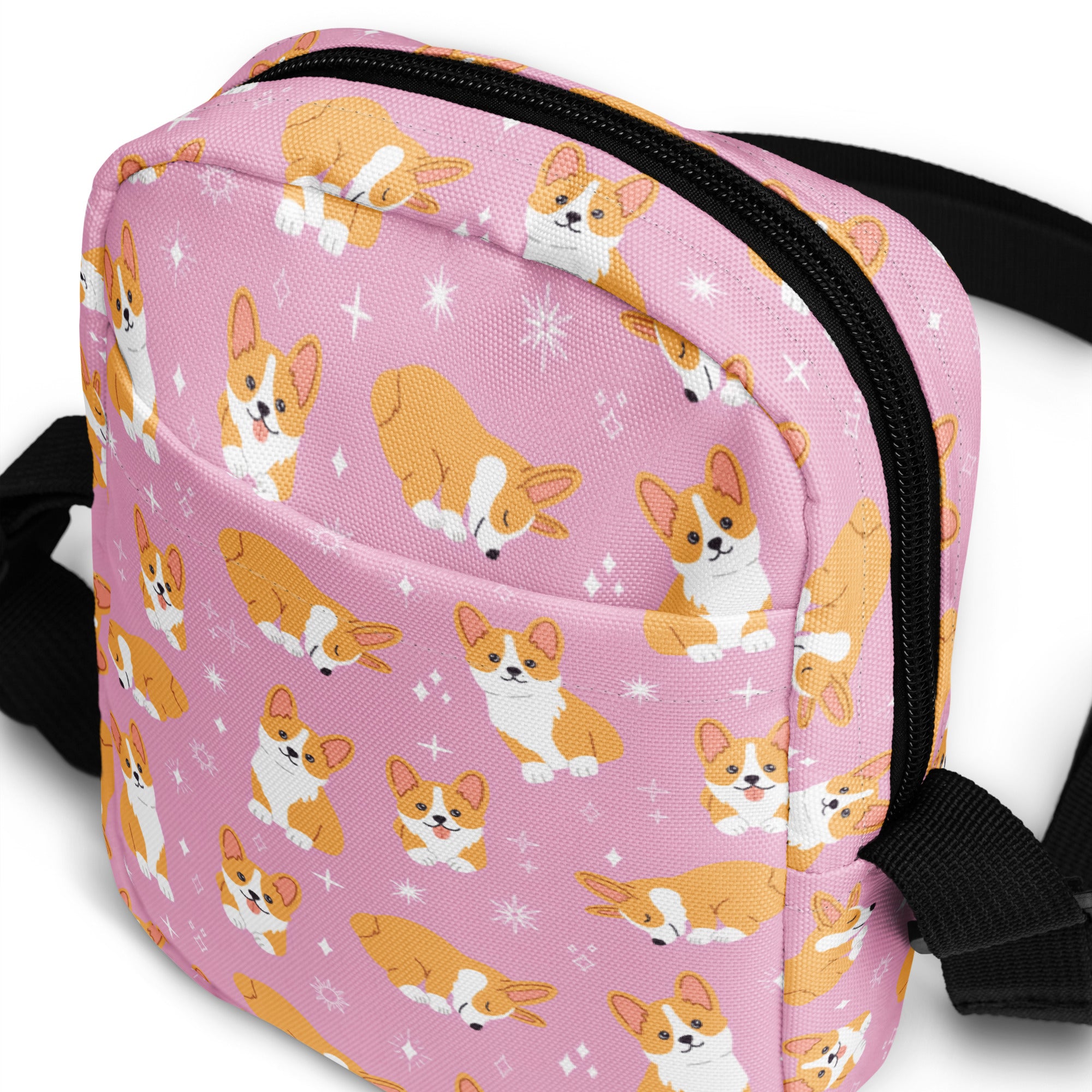Girls pink corgi crossbody purse with black zipper and straps featuring corgi pattern design