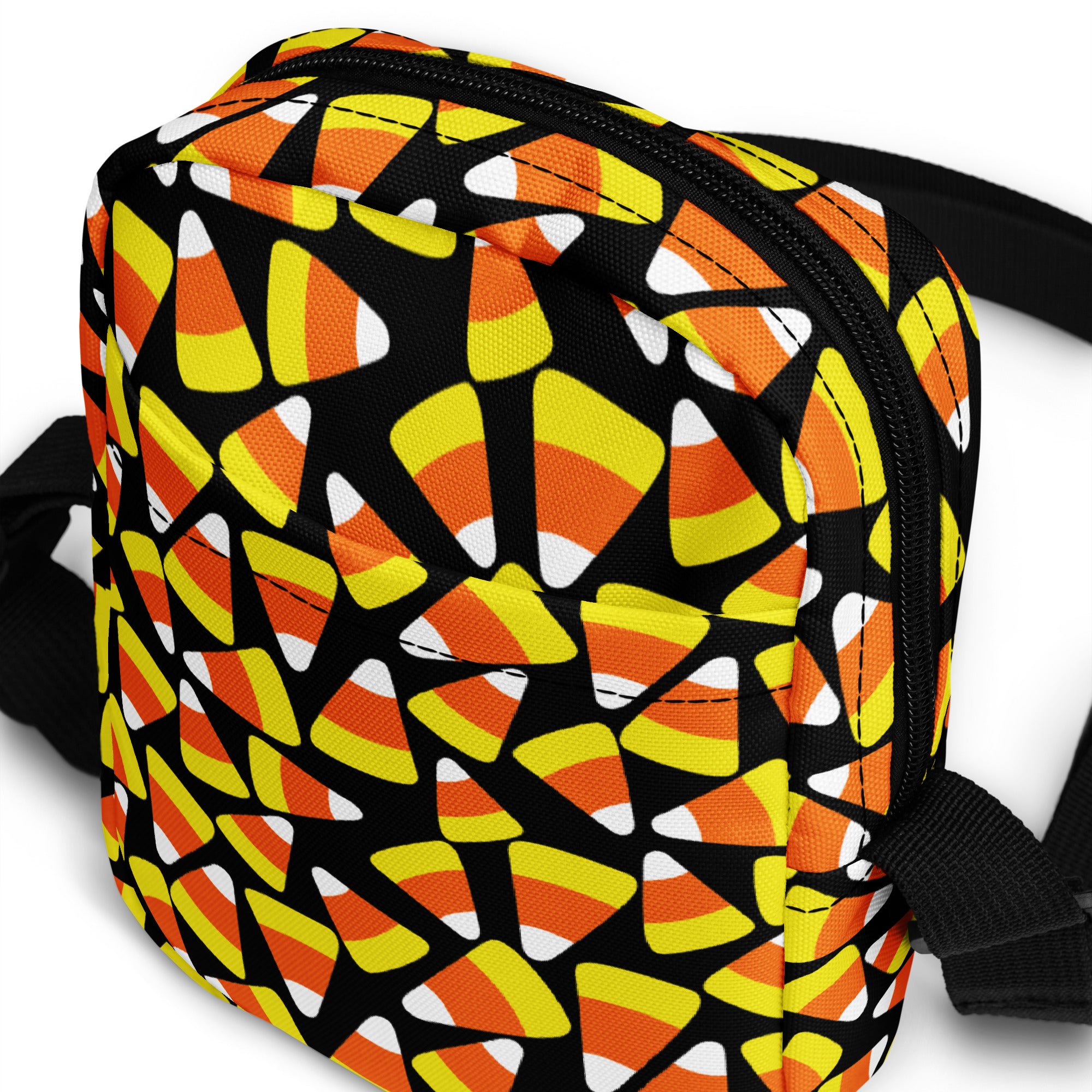 Girls candy corn halloween crossbody purse black fabric bag with vibrant orange yellow and white candy corn pattern