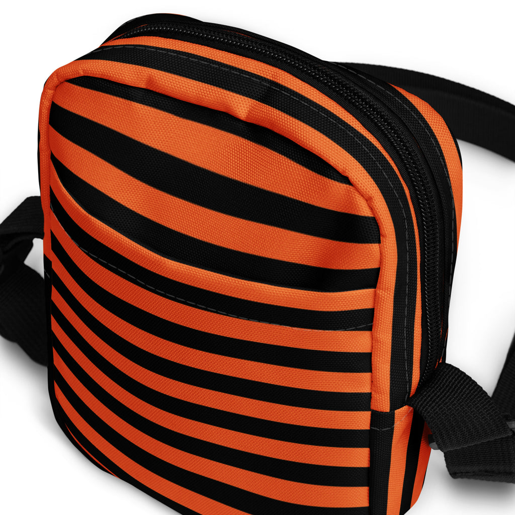 Girls orange and black striped canvas crossbody bag with zipper closure perfect for Halloween use