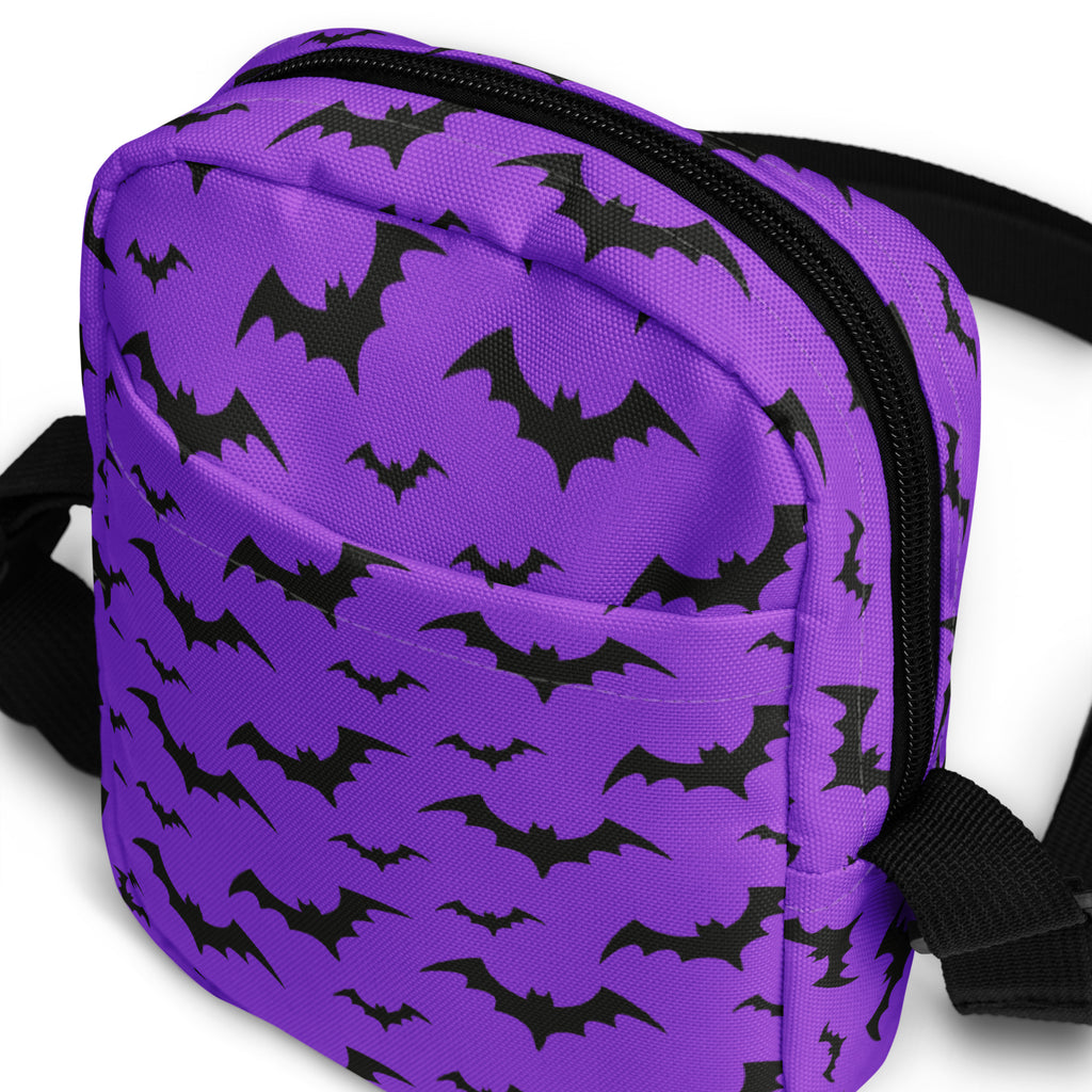 Kids purple bats Halloween crossbody purse with bat pattern, black zipper, and adjustable straps for easy carrying