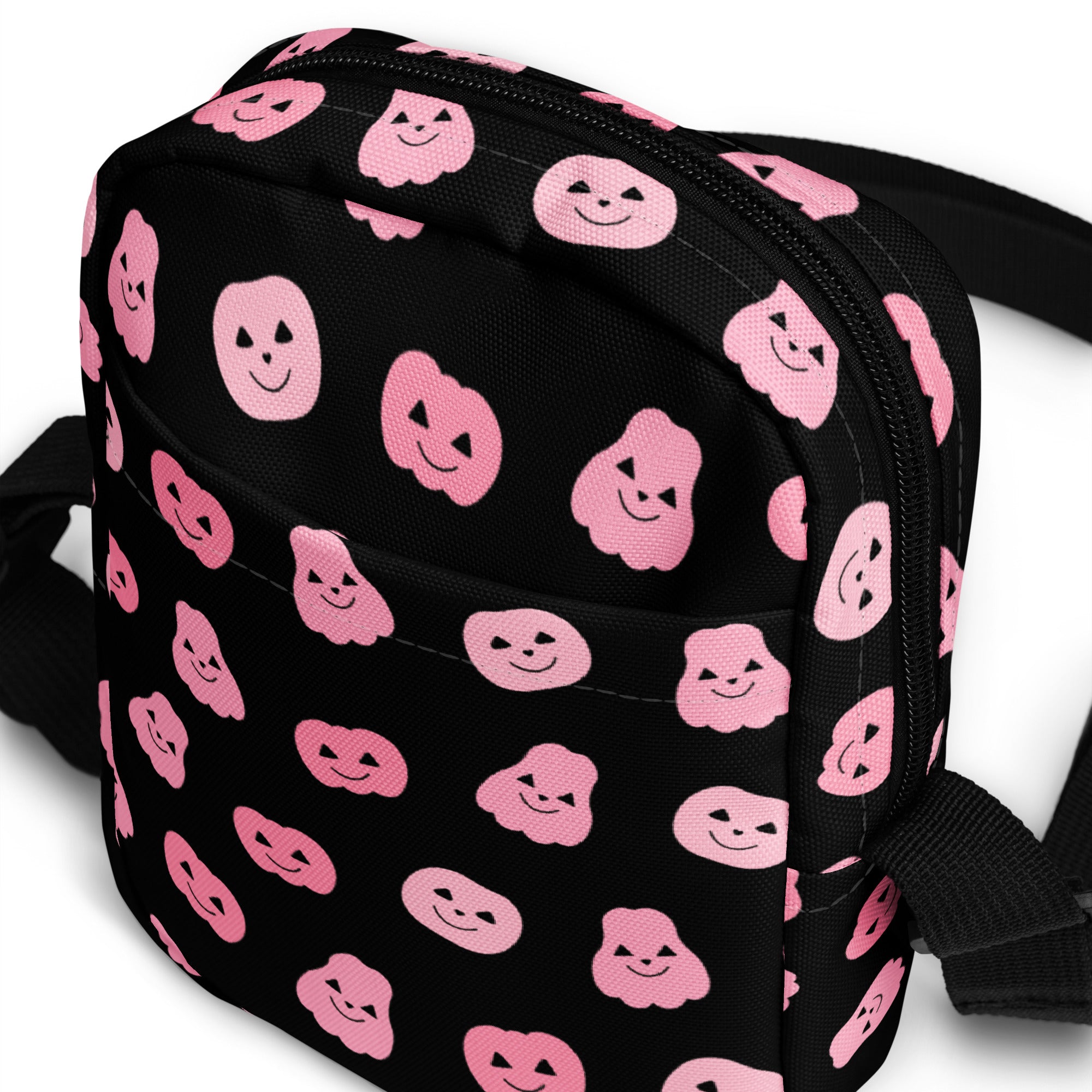 Black crossbody bag with pink smiling pumpkin faces printed for girls pink pumpkins halloween crossbody purse