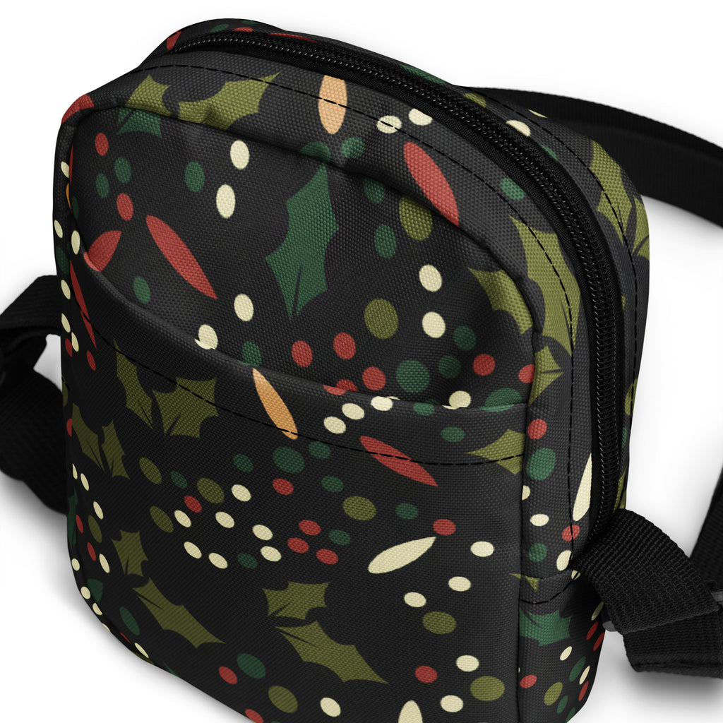 Girls christmas holly crossbody purse in black fabric with festive green holly leaves red berries and multicolor dots