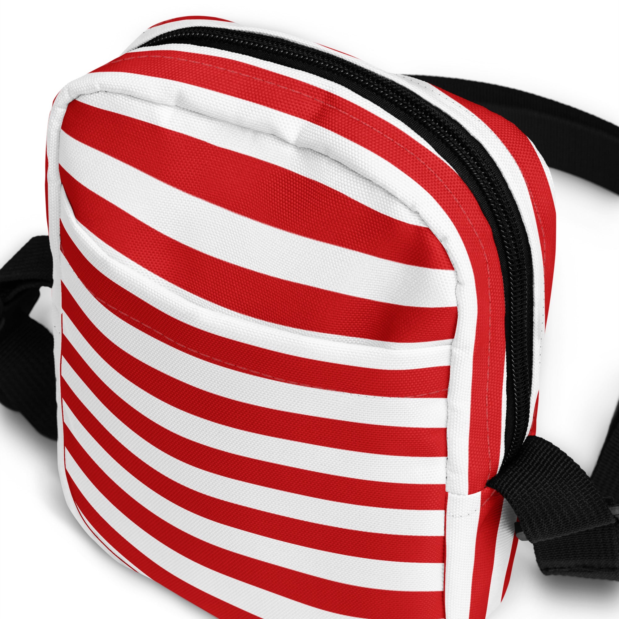 Girls red and white stripes crossbody purse with red and white striped canvas, black zipper, and black straps