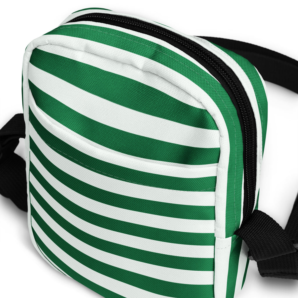 Green and white candy stripe canvas crossbody purse with black zipper and straps for christmas use