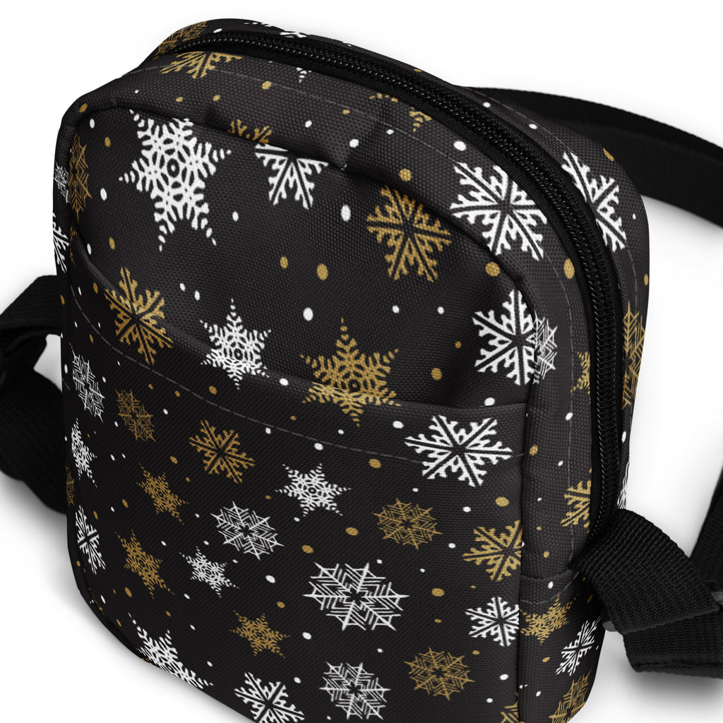 Girls black crossbody bag with white and gold snowflake patterns perfect for festive occasions and everyday use
