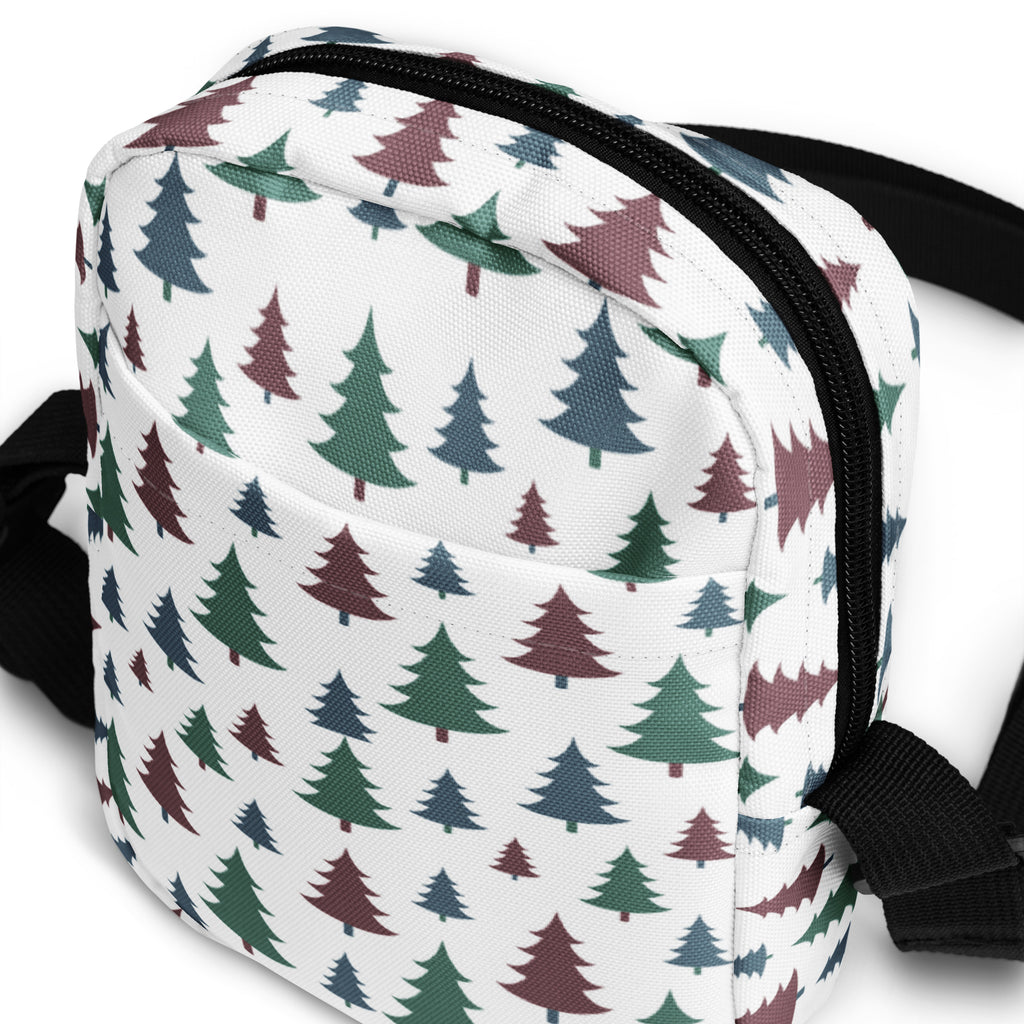 White canvas crossbody bag with playful green blue and maroon pastel Christmas tree pattern for girls