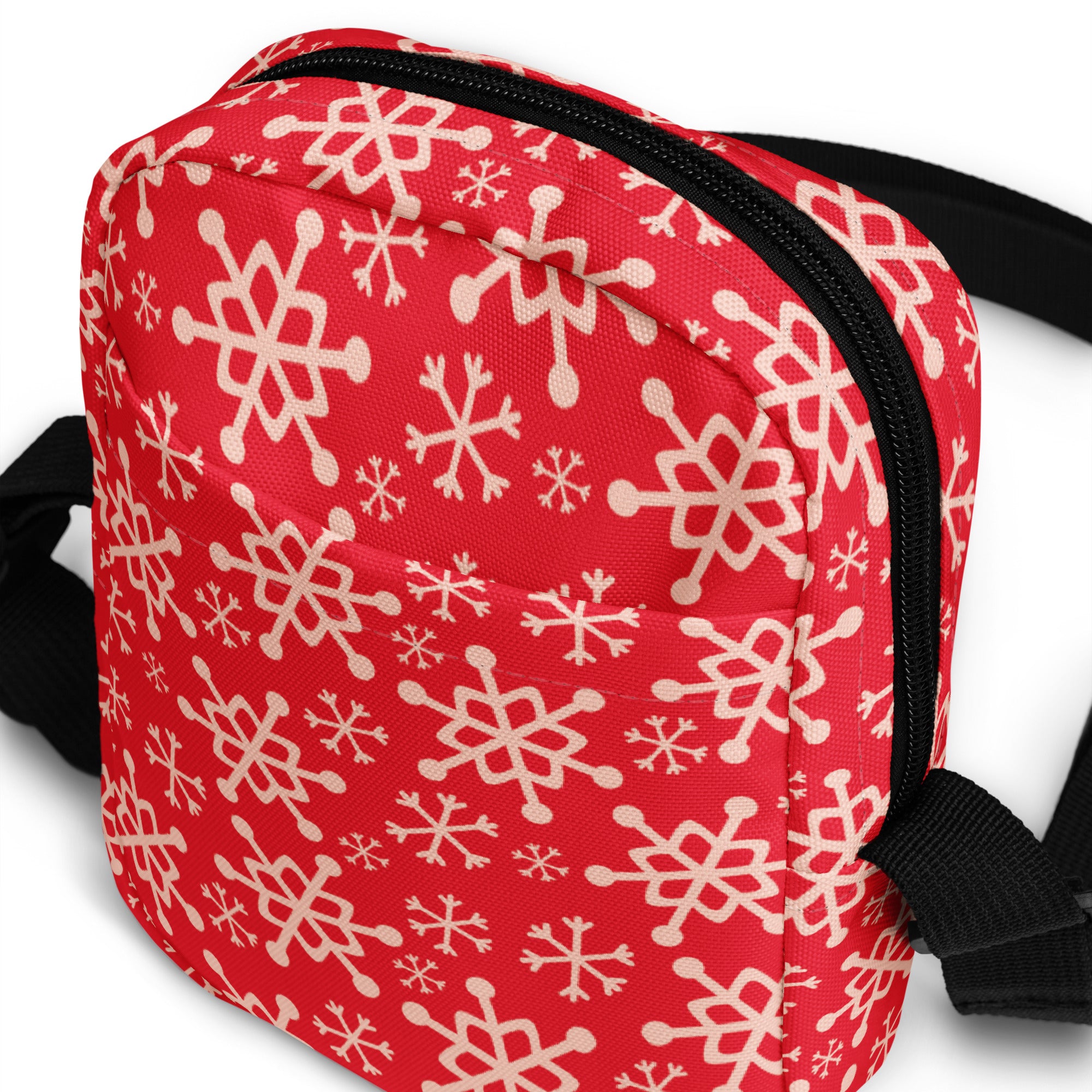 Girls red crossbody purse with cream snowflake pattern black zipper and straps perfect for winter use