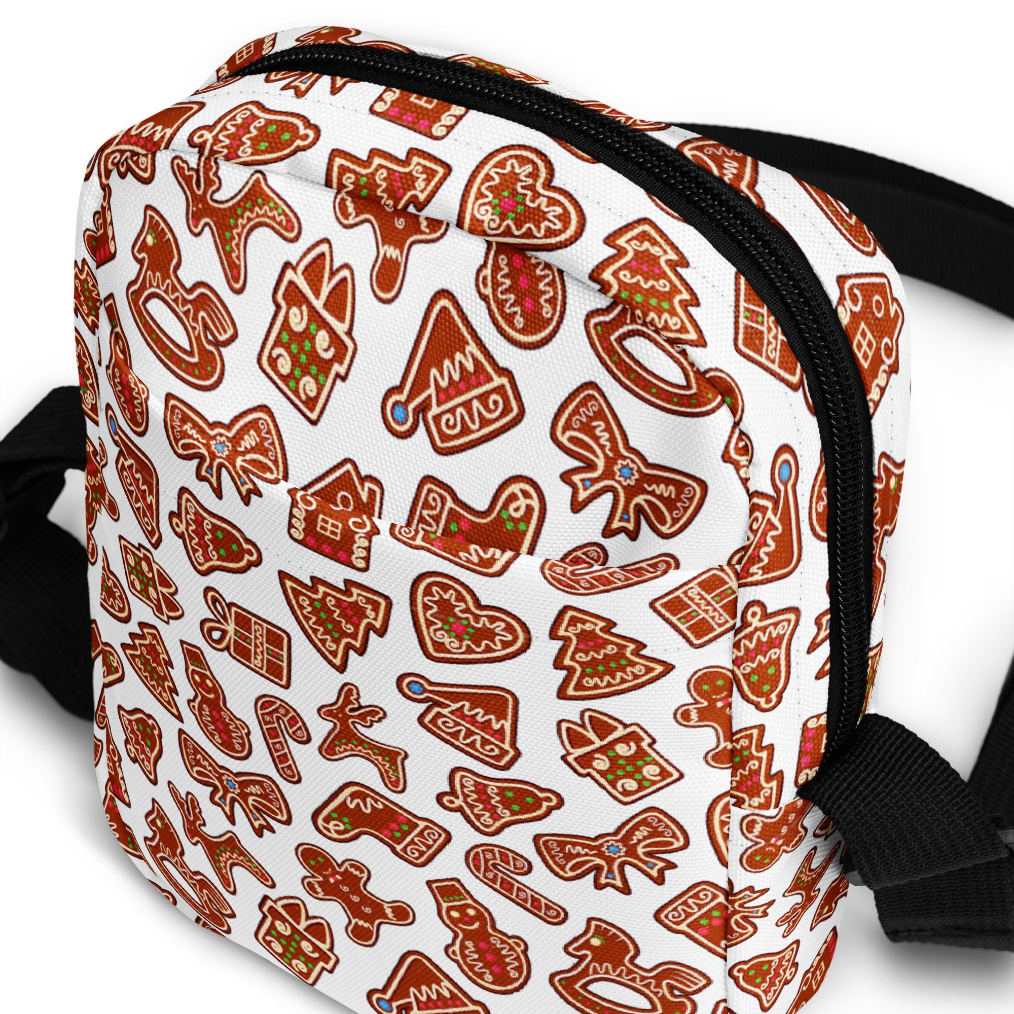 Girls gingerbread cookies crossbody purse in white featuring a festive brown gingerbread cookie pattern with green and red icing