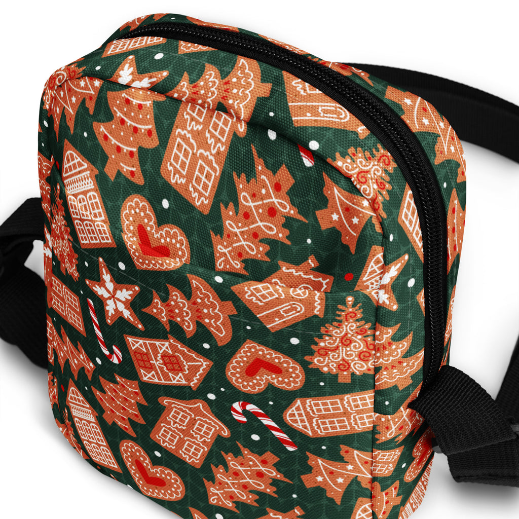 Girls green gingerbread Christmas crossbody purse with black zipper and straps featuring festive orange accents