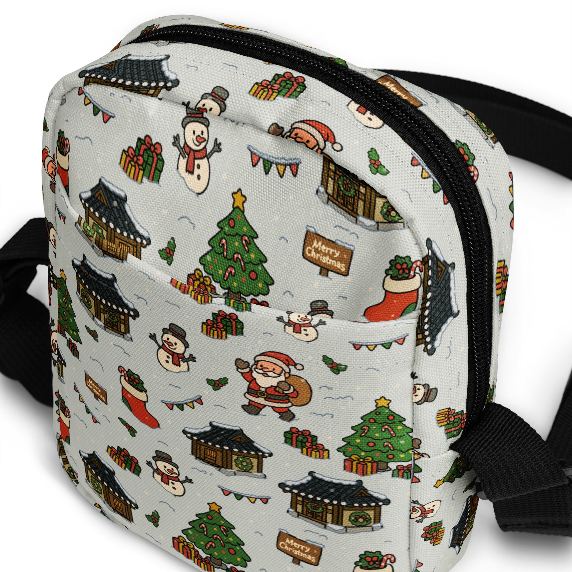 White crossbody bag with festive christmas pattern featuring snowmen santa claus trees and korean-style houses on gray fabric