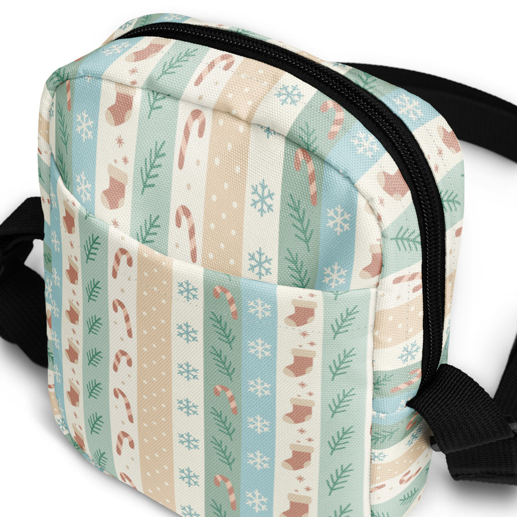 Girls pastel striped christmas crossbody purse with candy cane stocking snowflake print in blue beige and pink fabric