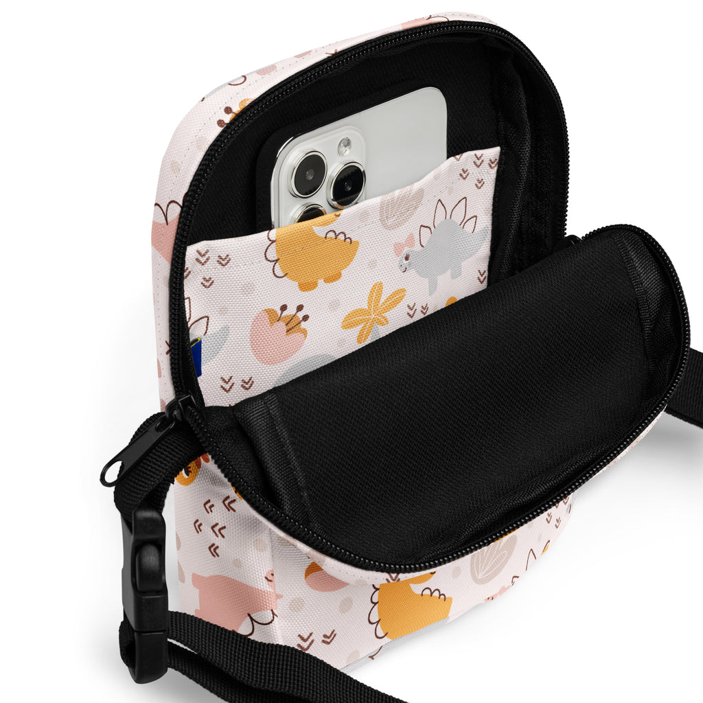 Girls floral dinosaur crossbody purse in pastel colors with black zipper and strap for phone carrying