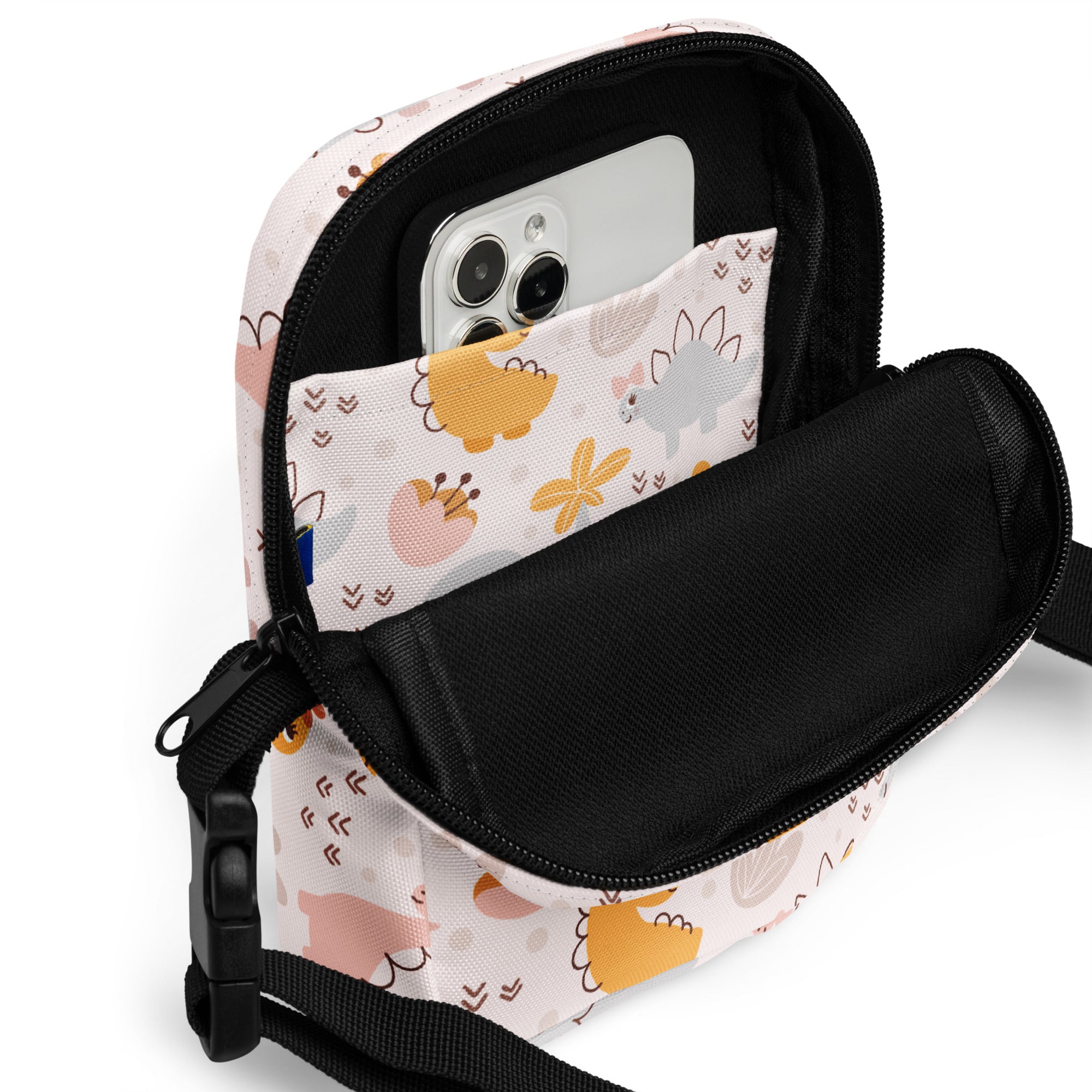 Girls floral dinosaur crossbody purse in pastel colors with black zipper and strap for phone carrying