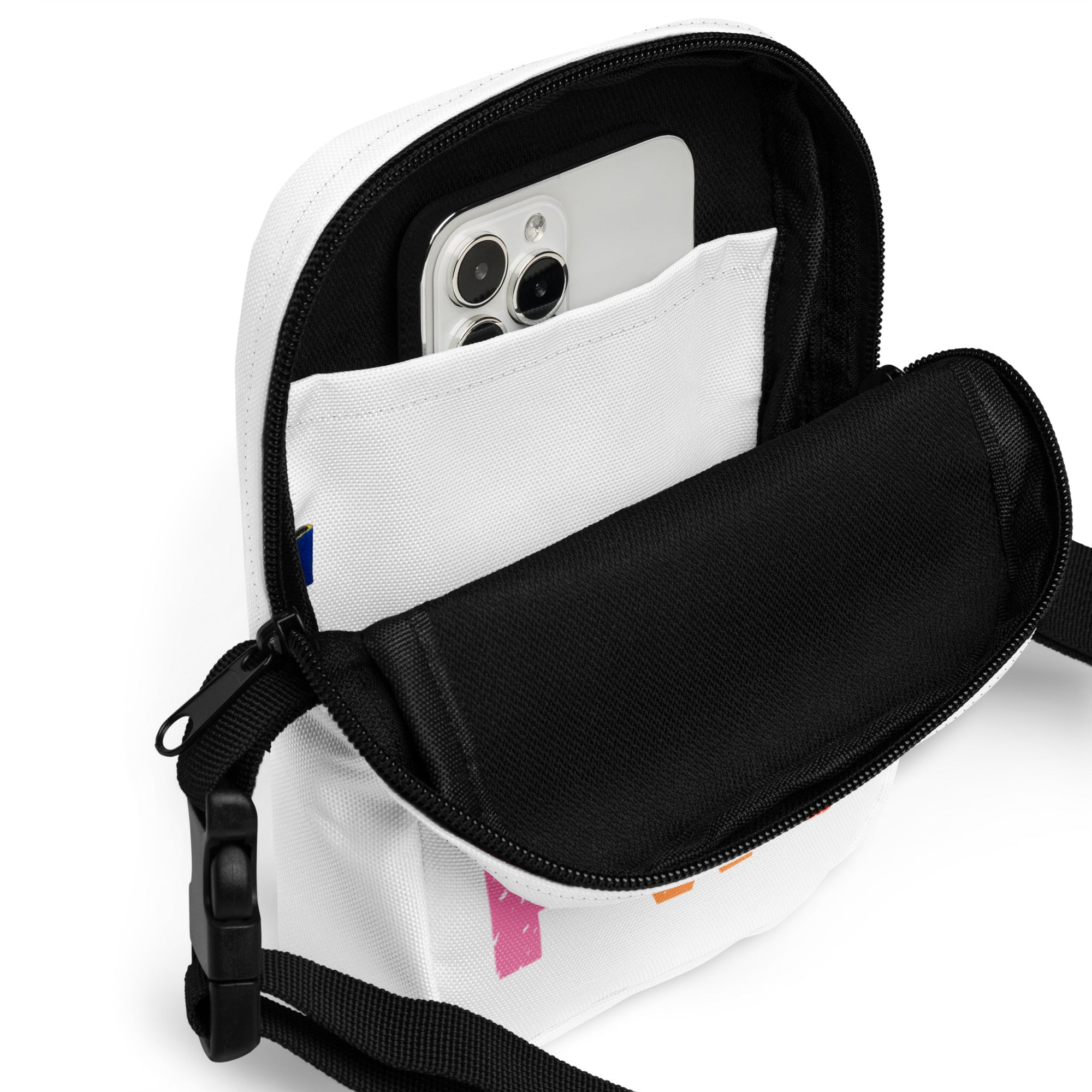White canvas girl power kids crossbody purse with black zipper strap and pink graphic detail on the side