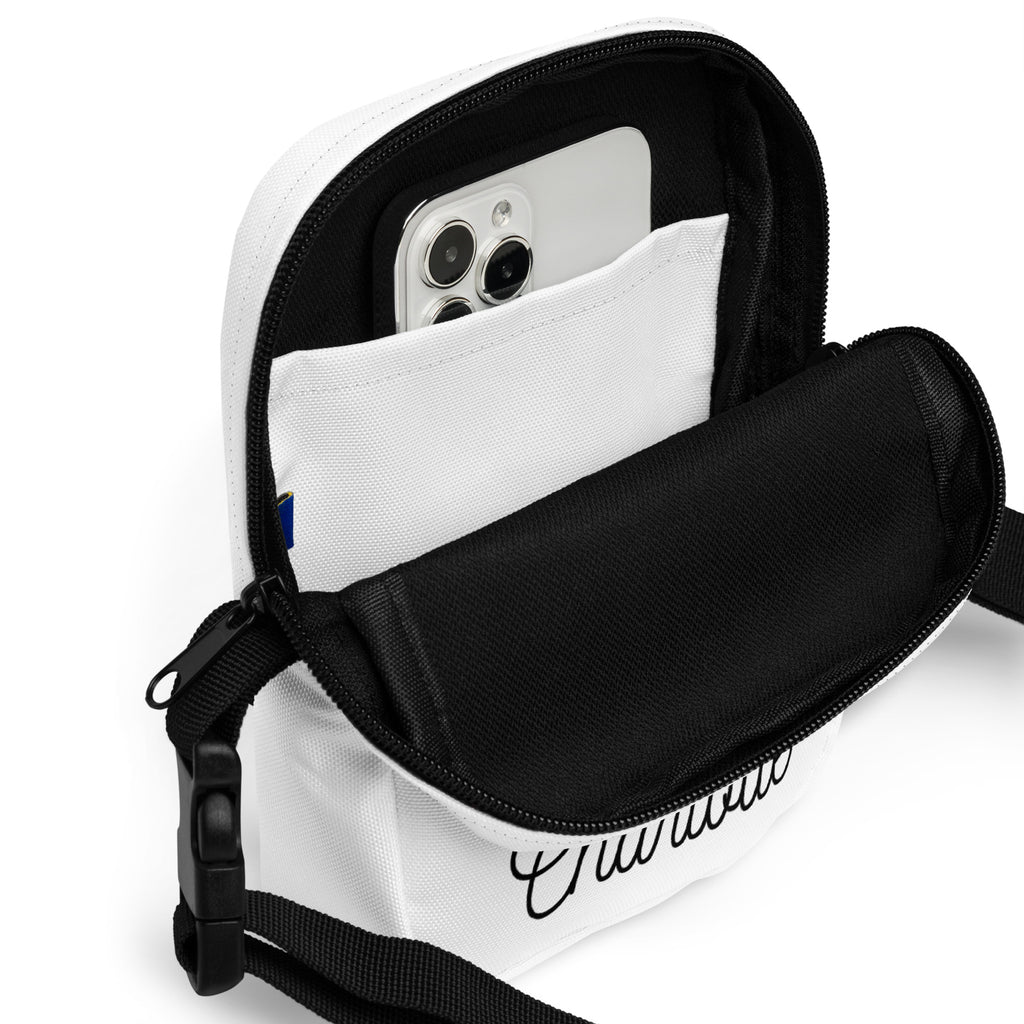 White canvas girls custom name crossbody purse with black zipper strap and cursive chic logo on the front